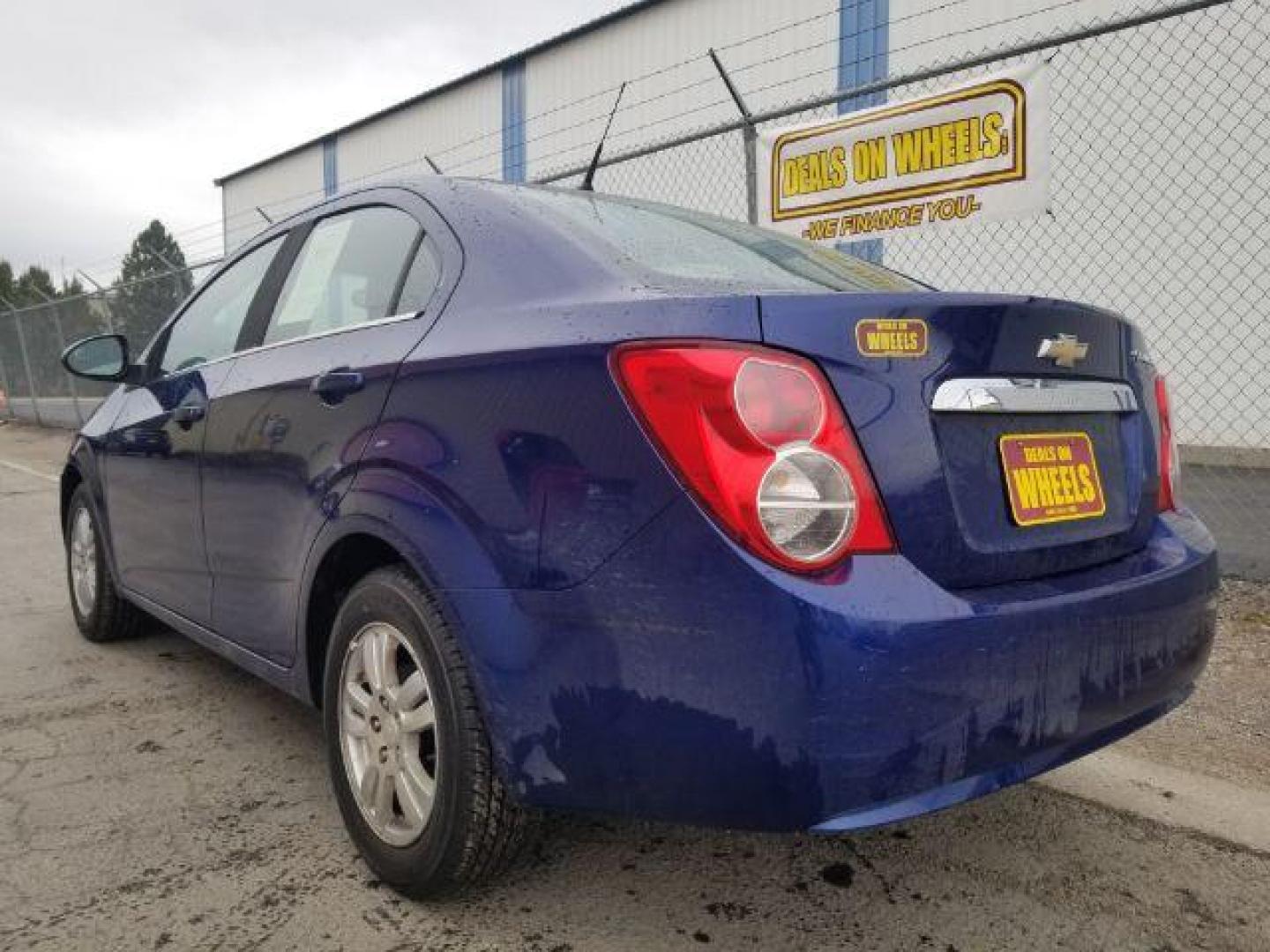 2014 Chevrolet Sonic LT Auto Sedan (1G1JC5SH7E4) with an 1.8L L4 DOHC 24V engine, 6-Speed Automatic transmission, located at 601 E. Idaho St., Kalispell, MT, 59901, 48.203983, -114.308662 - Photo#5