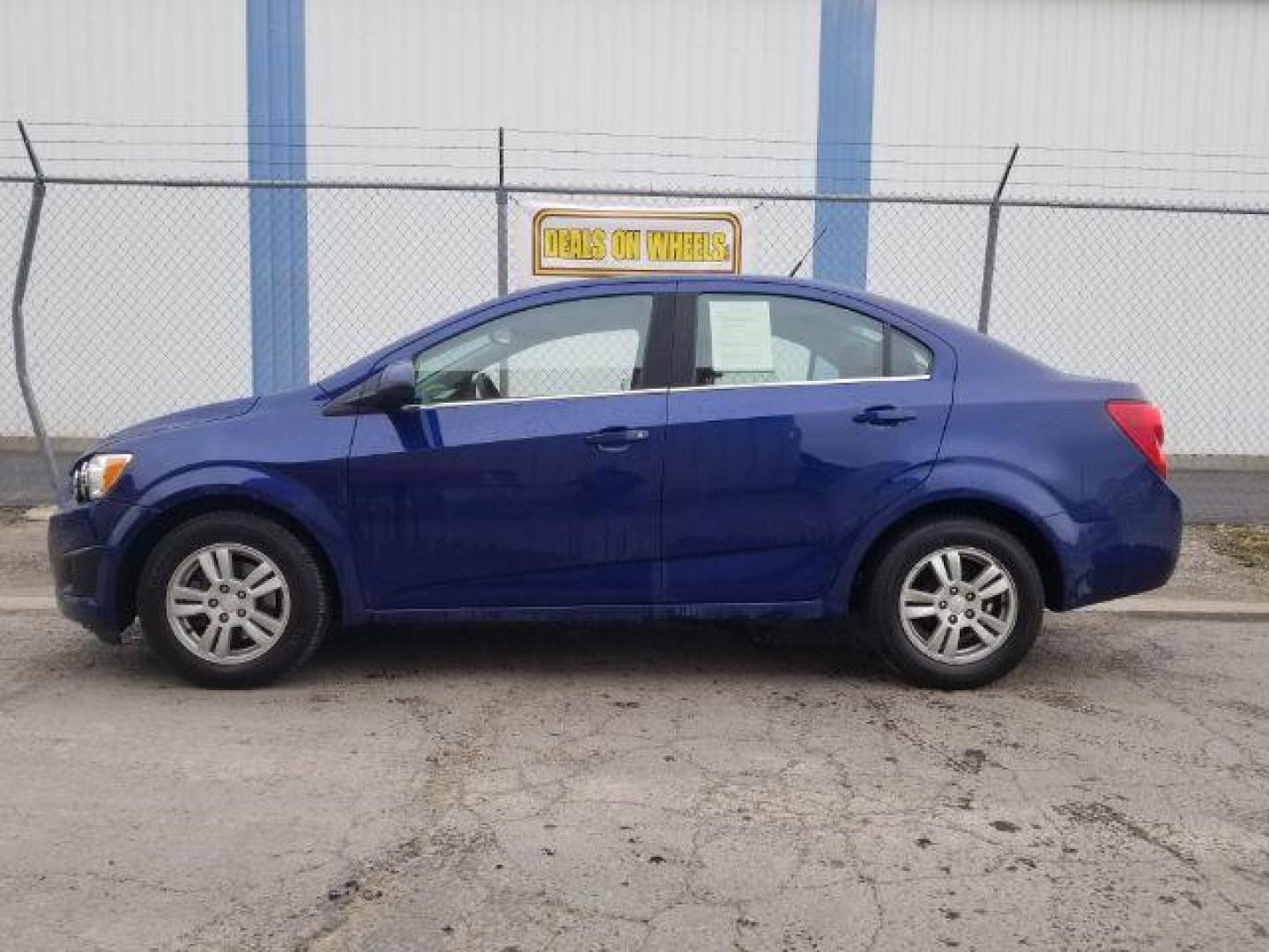 2014 Chevrolet Sonic LT Auto Sedan (1G1JC5SH7E4) with an 1.8L L4 DOHC 24V engine, 6-Speed Automatic transmission, located at 601 E. Idaho St., Kalispell, MT, 59901, 48.203983, -114.308662 - Photo#6