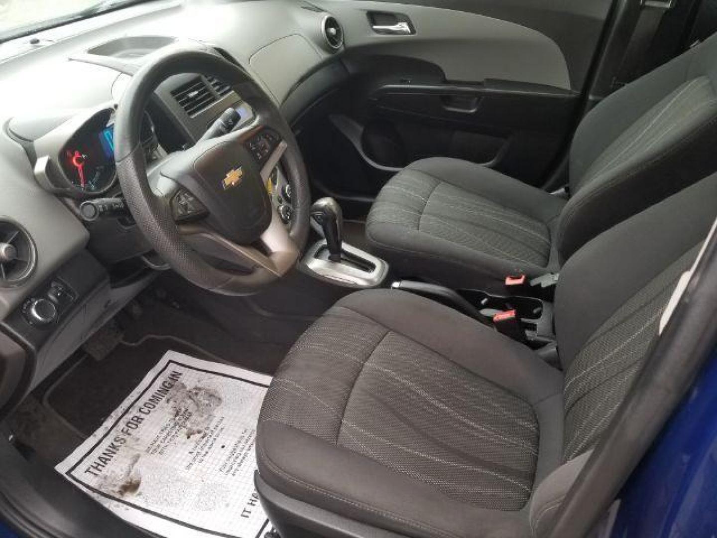 2014 Chevrolet Sonic LT Auto Sedan (1G1JC5SH7E4) with an 1.8L L4 DOHC 24V engine, 6-Speed Automatic transmission, located at 601 E. Idaho St., Kalispell, MT, 59901, 48.203983, -114.308662 - Photo#7