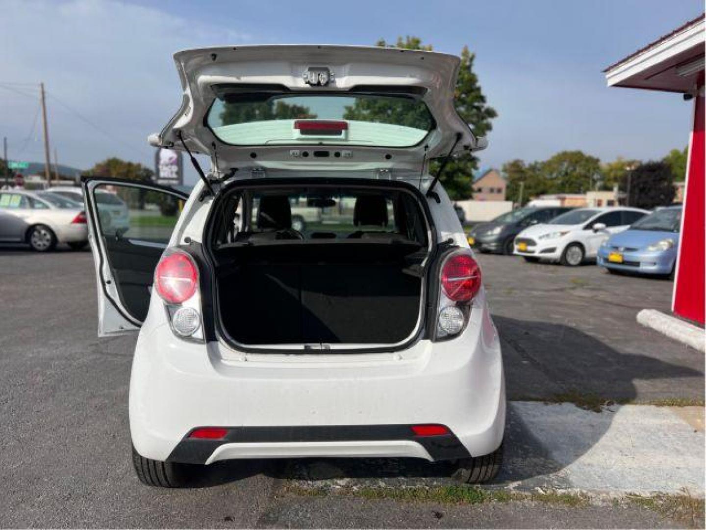 2014 Chevrolet Spark 1LT Auto (KL8CD6S94EC) with an 1.2L L4 16V DOHC engine, Continuously Variable Transmission transmission, located at 601 E. Idaho St., Kalispell, MT, 59901, 48.203983, -114.308662 - Photo#10