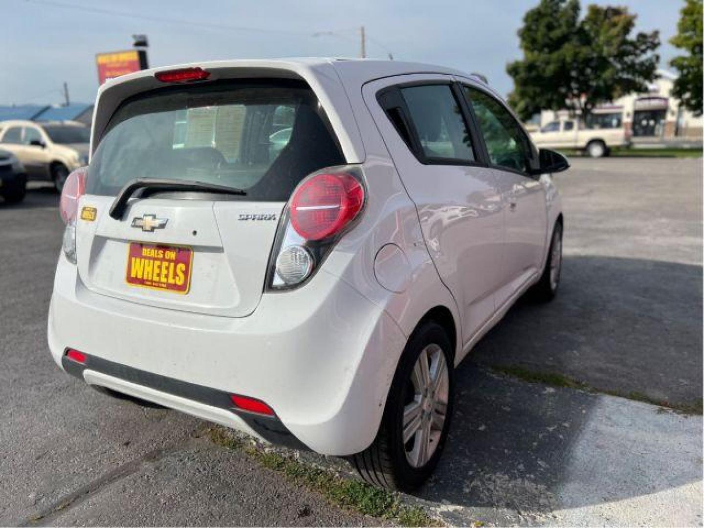 2014 Chevrolet Spark 1LT Auto (KL8CD6S94EC) with an 1.2L L4 16V DOHC engine, Continuously Variable Transmission transmission, located at 601 E. Idaho St., Kalispell, MT, 59901, 48.203983, -114.308662 - Photo#4