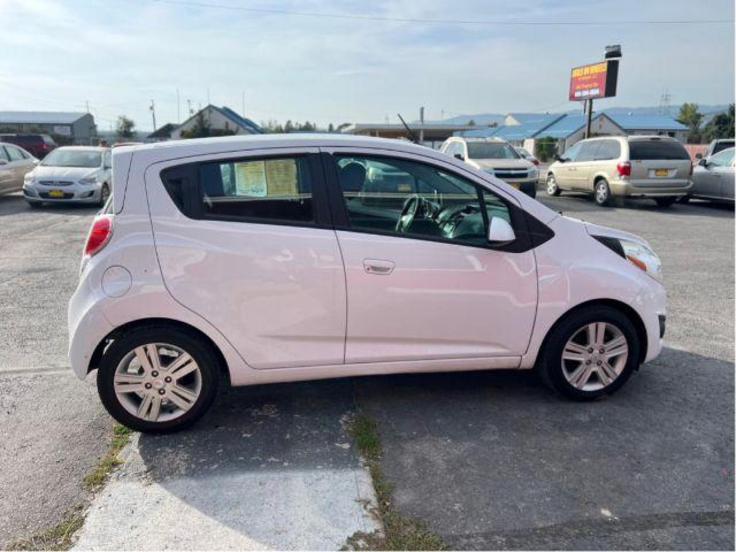 2014 Chevrolet Spark 1LT Auto (KL8CD6S94EC) with an 1.2L L4 16V DOHC engine, Continuously Variable Transmission transmission, located at 601 E. Idaho St., Kalispell, MT, 59901, 48.203983, -114.308662 - Photo#5