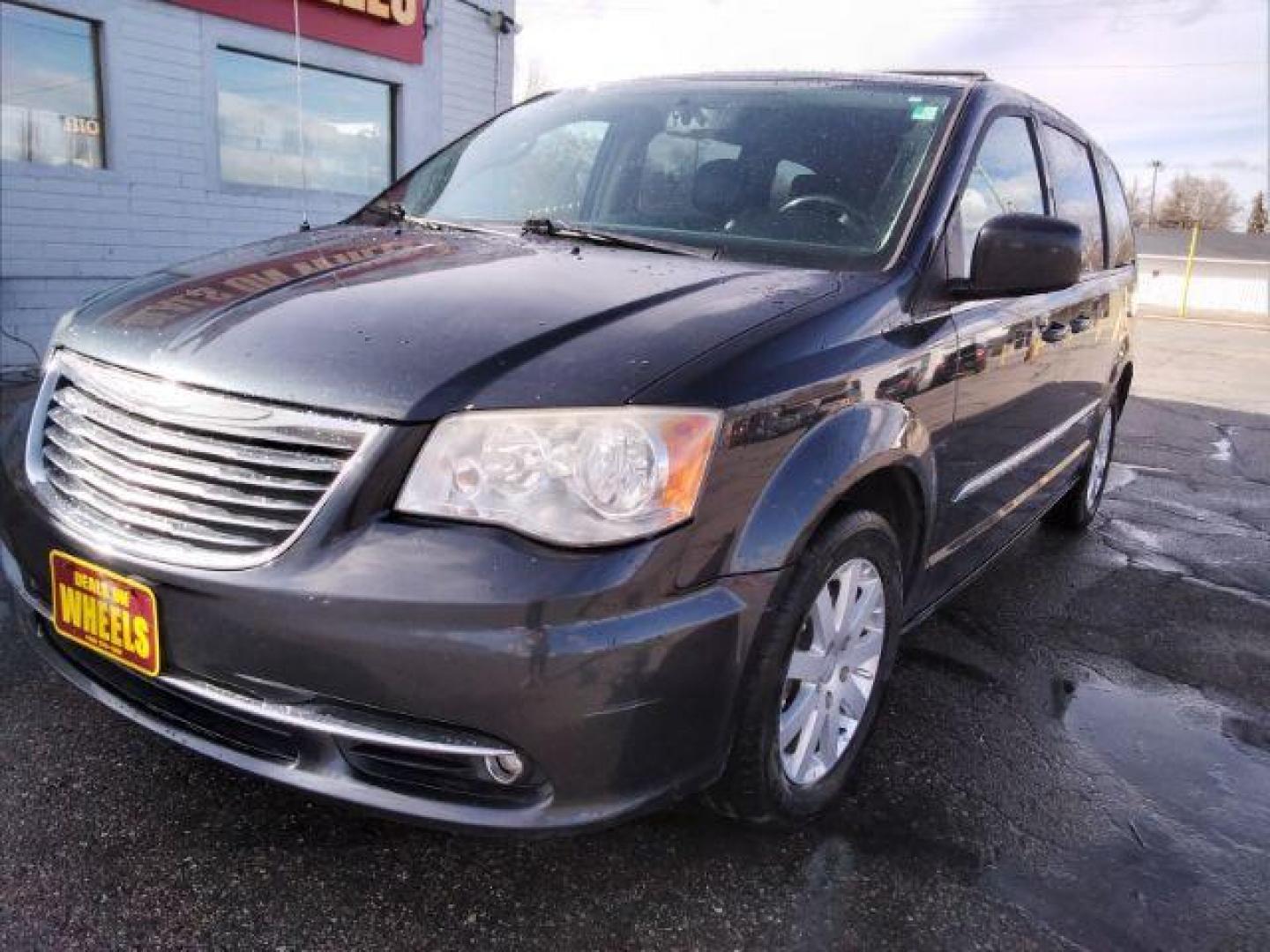 2014 Chrysler Town and Country Touring (2C4RC1BG1ER) with an 3.6L V6 DOHC 24V engine, 6-Speed Automatic transmission, located at 4047 Montana Ave., Billings, MT, 59101, 45.770847, -108.529800 - Photo#0