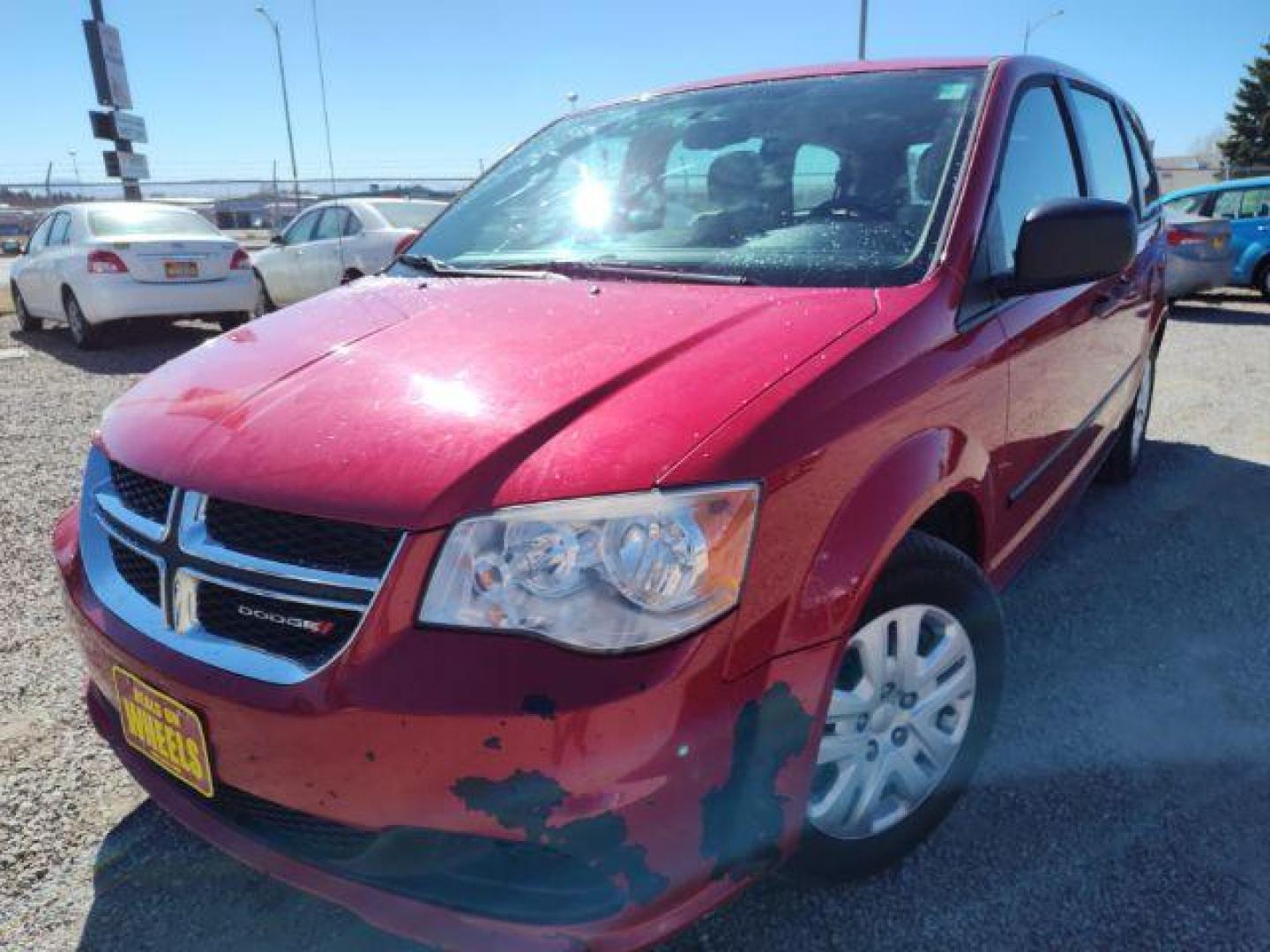 2014 Dodge Grand Caravan SE (2C4RDGBG2ER) with an 3.6L V6 DOHC 24V engine, 6-Speed Automatic transmission, located at 4801 10th Ave S,, Great Falls, MT, 59405, 47.494347, -111.229942 - Photo#0