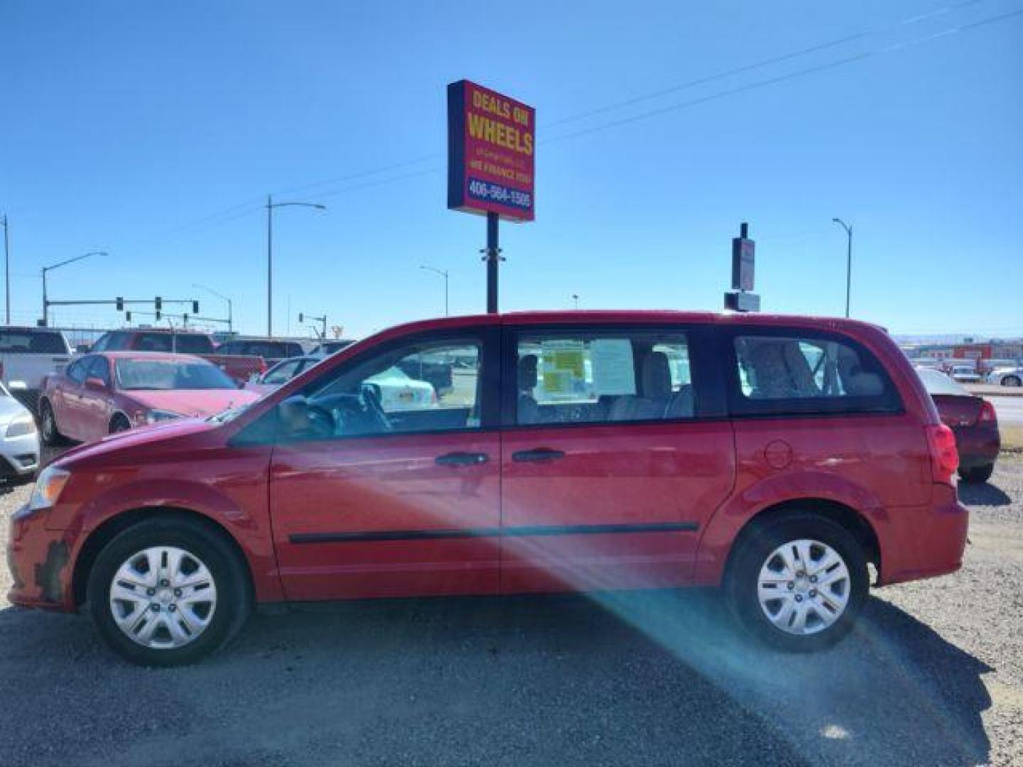 2014 Dodge Grand Caravan SE (2C4RDGBG2ER) with an 3.6L V6 DOHC 24V engine, 6-Speed Automatic transmission, located at 4801 10th Ave S,, Great Falls, MT, 59405, 47.494347, -111.229942 - Photo#1