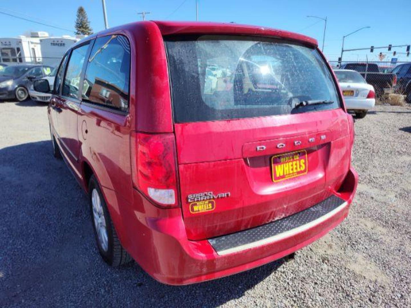 2014 Dodge Grand Caravan SE (2C4RDGBG2ER) with an 3.6L V6 DOHC 24V engine, 6-Speed Automatic transmission, located at 4801 10th Ave S,, Great Falls, MT, 59405, 47.494347, -111.229942 - Photo#2