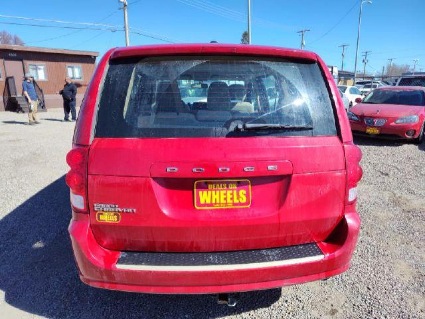 2014 Dodge Grand Caravan SE (2C4RDGBG2ER) with an 3.6L V6 DOHC 24V engine, 6-Speed Automatic transmission, located at 4801 10th Ave S,, Great Falls, MT, 59405, 47.494347, -111.229942 - Photo#3