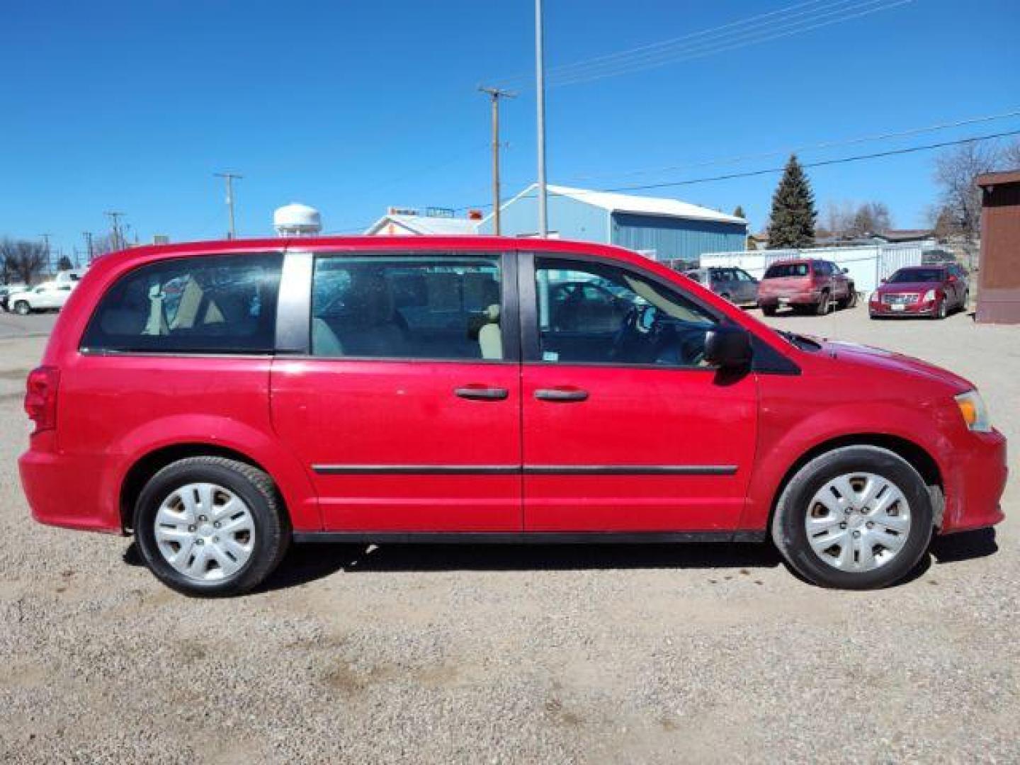 2014 Dodge Grand Caravan SE (2C4RDGBG2ER) with an 3.6L V6 DOHC 24V engine, 6-Speed Automatic transmission, located at 4801 10th Ave S,, Great Falls, MT, 59405, 47.494347, -111.229942 - Photo#5