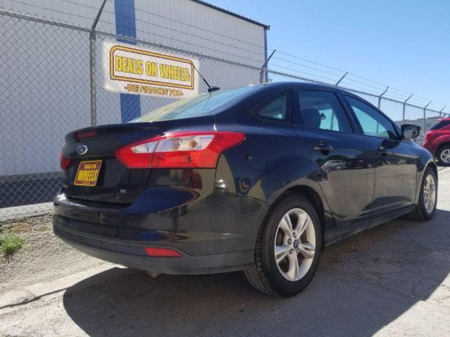 2014 Ford Focus SE Sedan (1FADP3F20EL) with an 2.0L L4 DOHC 16V engine, located at 4801 10th Ave S,, Great Falls, MT, 59405, 47.494347, -111.229942 - Photo#11