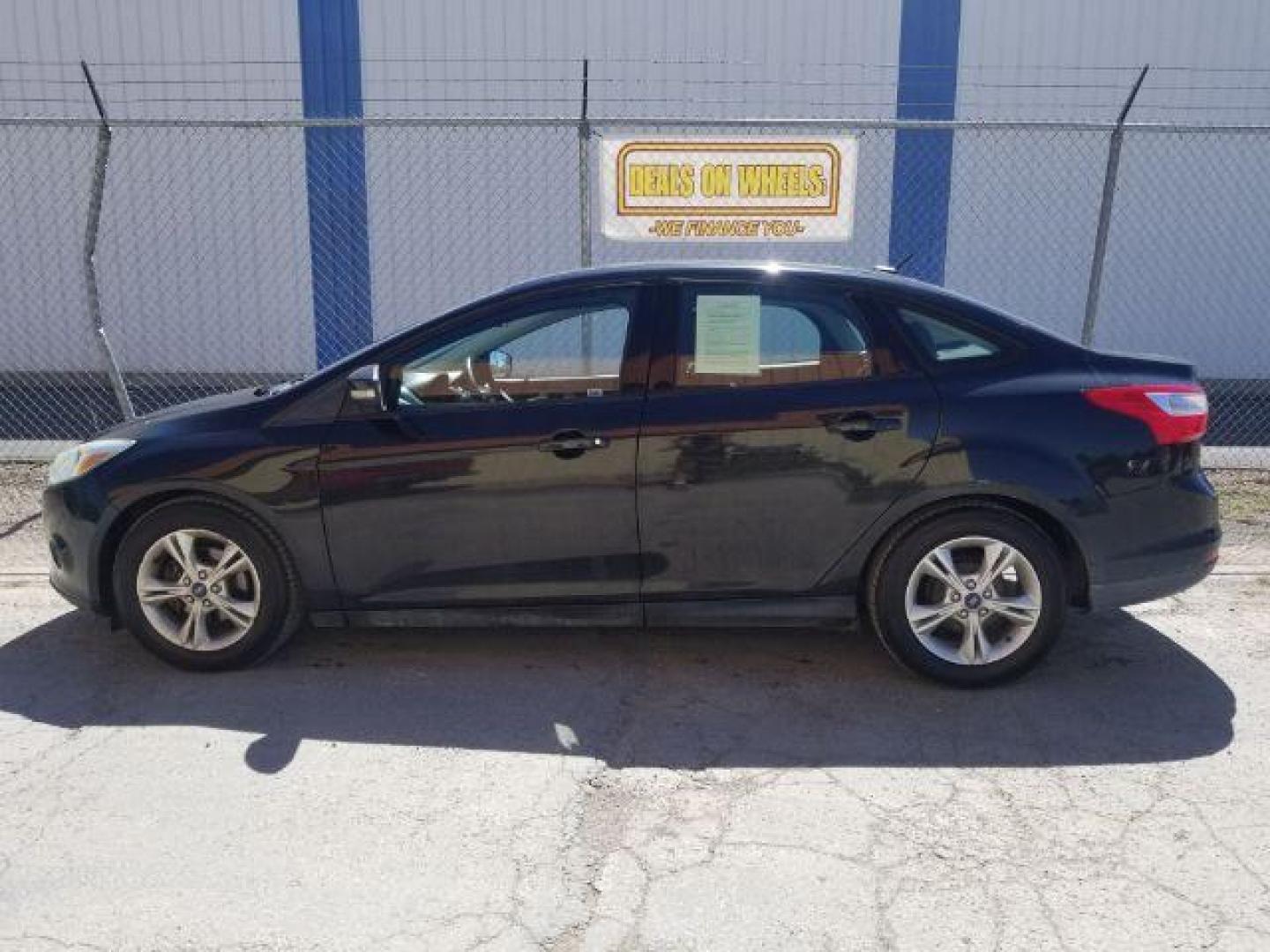 2014 Ford Focus SE Sedan (1FADP3F20EL) with an 2.0L L4 DOHC 16V engine, located at 4801 10th Ave S,, Great Falls, MT, 59405, 47.494347, -111.229942 - Photo#12