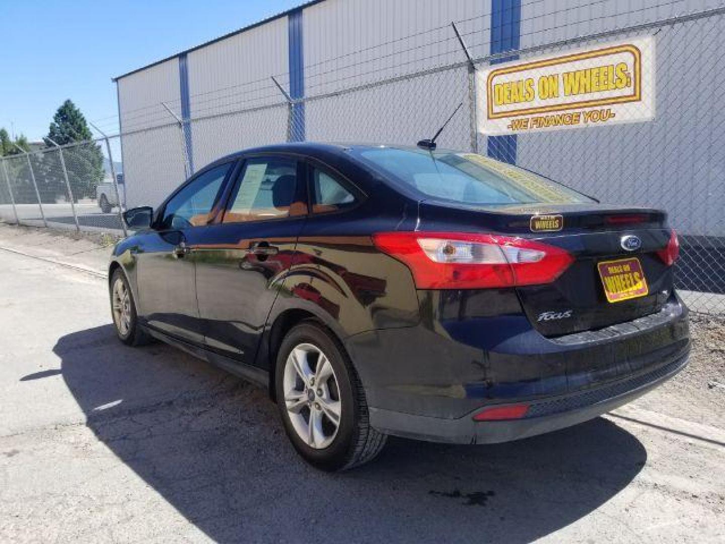 2014 Ford Focus SE Sedan (1FADP3F20EL) with an 2.0L L4 DOHC 16V engine, located at 4801 10th Ave S,, Great Falls, MT, 59405, 47.494347, -111.229942 - Photo#13