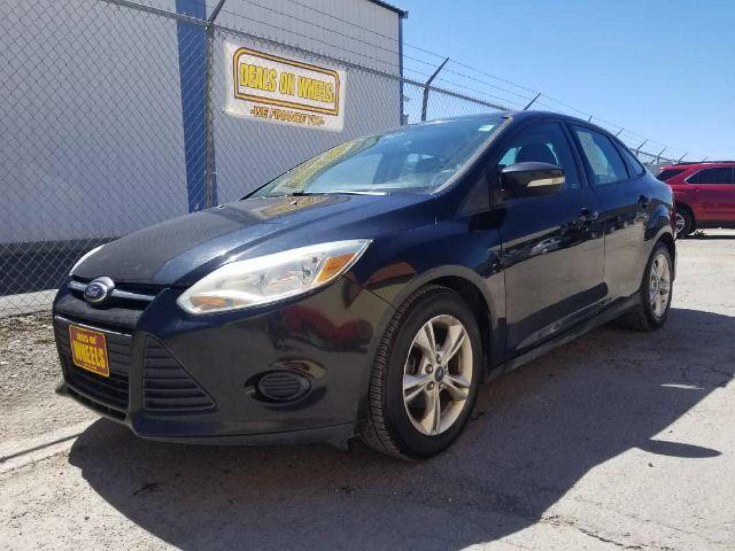 2014 Ford Focus SE Sedan (1FADP3F20EL) with an 2.0L L4 DOHC 16V engine, located at 4801 10th Ave S,, Great Falls, MT, 59405, 47.494347, -111.229942 - Photo#0