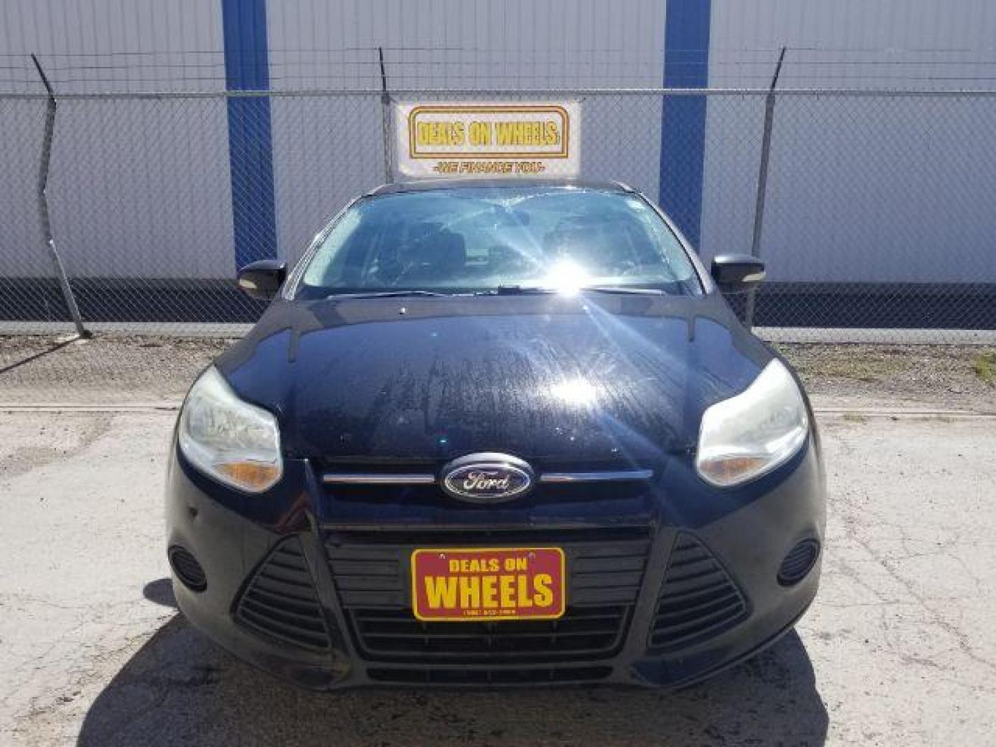 2014 Ford Focus SE Sedan (1FADP3F20EL) with an 2.0L L4 DOHC 16V engine, located at 4801 10th Ave S,, Great Falls, MT, 59405, 47.494347, -111.229942 - Photo#2