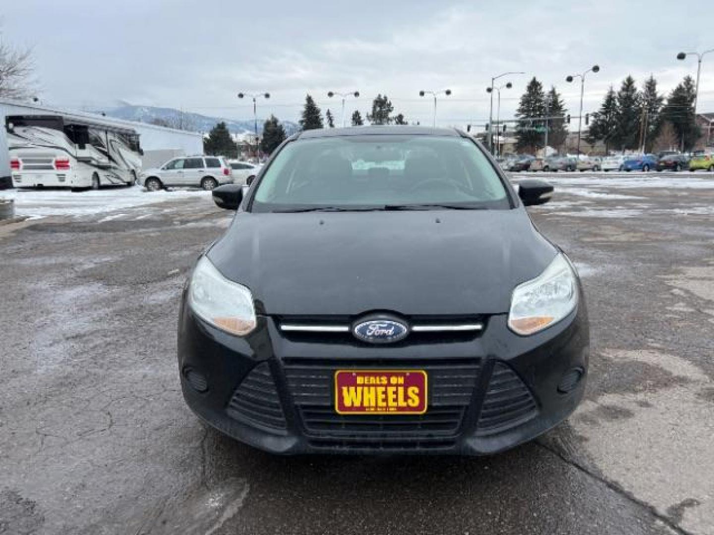 2014 Tuxedo Black Metalli Ford Focus SE Sedan (1FADP3F20EL) with an 2.0L L4 DOHC 16V engine, located at 1800 West Broadway, Missoula, 59808, (406) 543-1986, 46.881348, -114.023628 - Looking for a reliable and affordable pre-owned vehicle in Missoula? Look no further than this 2014 Ford Focus SE Sedan available at DOW - Missoula. With a price tag of $15,495, this vehicle offers great value for your money. The Ford Focus is a popular choice among sedan lovers, and this 2014 mod - Photo#1