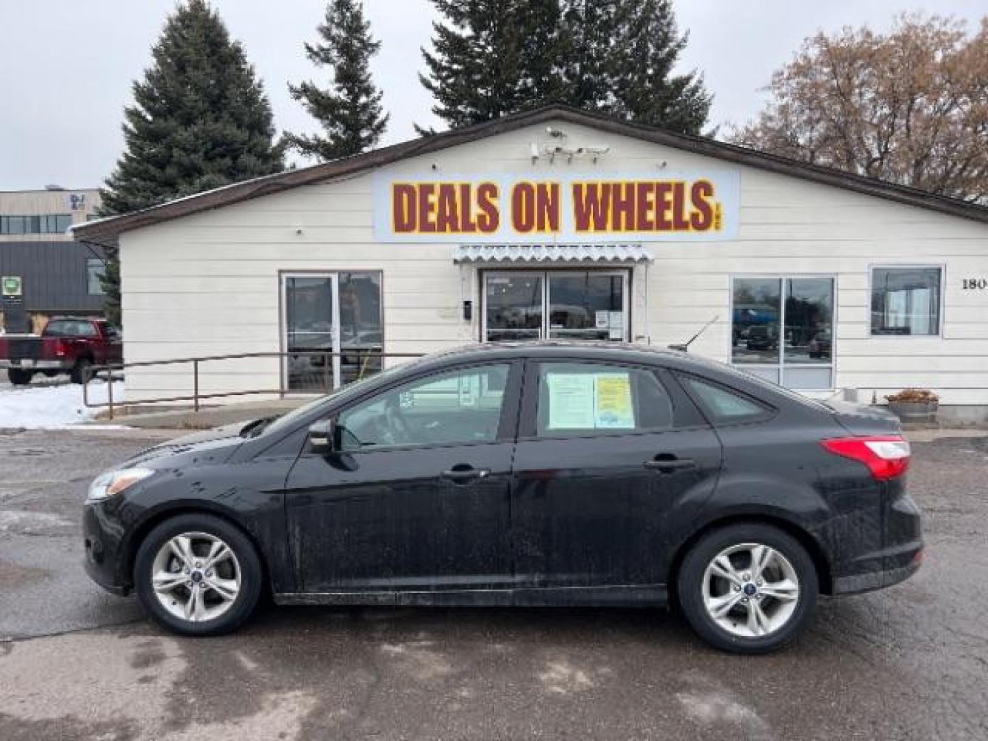 2014 Tuxedo Black Metalli Ford Focus SE Sedan (1FADP3F20EL) with an 2.0L L4 DOHC 16V engine, located at 1800 West Broadway, Missoula, 59808, (406) 543-1986, 46.881348, -114.023628 - Looking for a reliable and affordable pre-owned vehicle in Missoula? Look no further than this 2014 Ford Focus SE Sedan available at DOW - Missoula. With a price tag of $15,495, this vehicle offers great value for your money. The Ford Focus is a popular choice among sedan lovers, and this 2014 mod - Photo#5