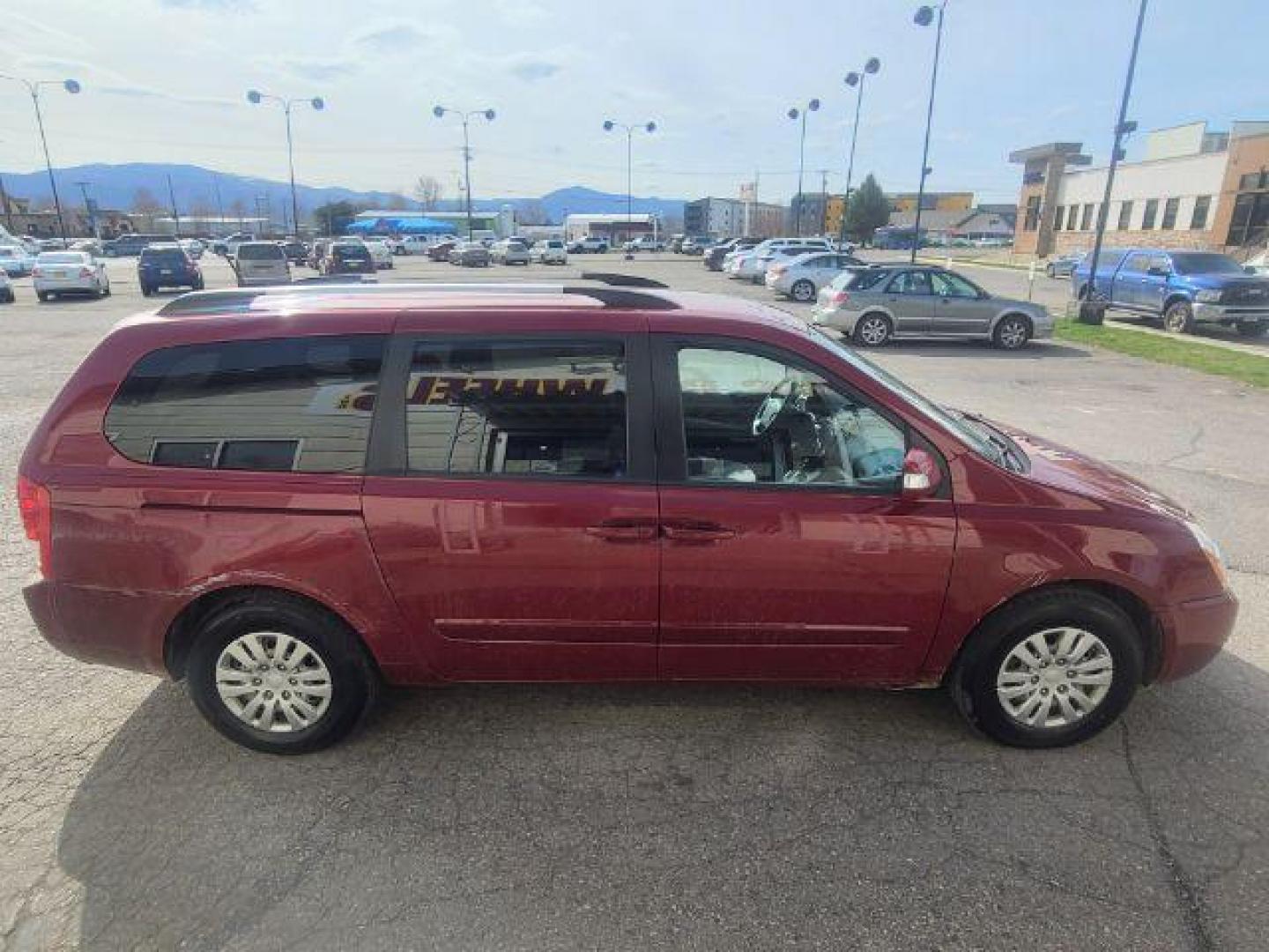 2014 Kia Sedona LX LWB (KNDMG4C78E6) with an 3.8L V6 DOHC 24V engine, 5-Speed Automatic transmission, located at 1800 West Broadway, Missoula, 59808, (406) 543-1986, 46.881348, -114.023628 - Photo#2