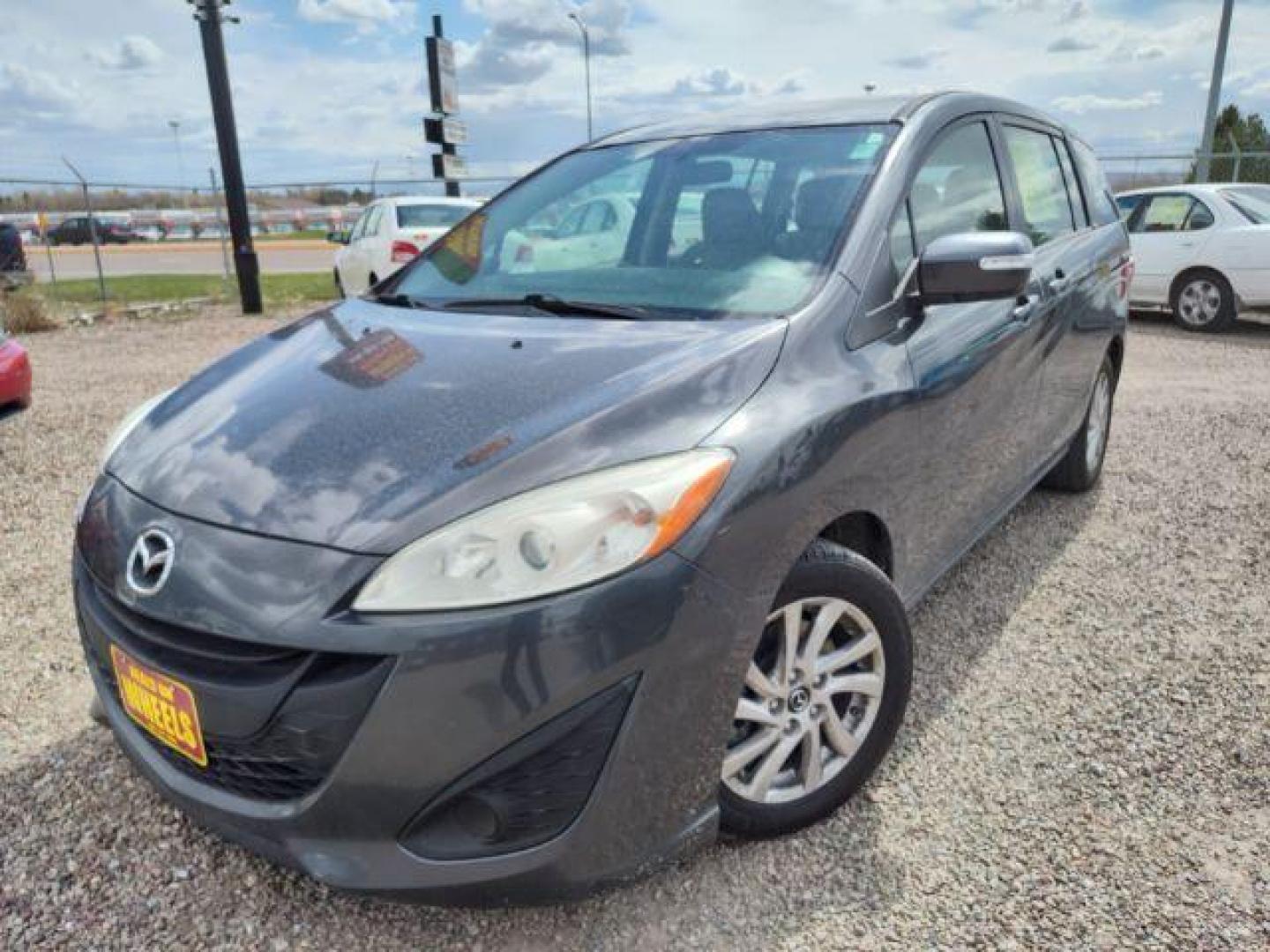 2014 Mazda MAZDA5 Sport AT (JM1CW2BL5E0) with an 2.5L L4 DOHC 16V engine, 5-Speed Automatic transmission, located at 4801 10th Ave S,, Great Falls, MT, 59405, 47.494347, -111.229942 - Photo#0