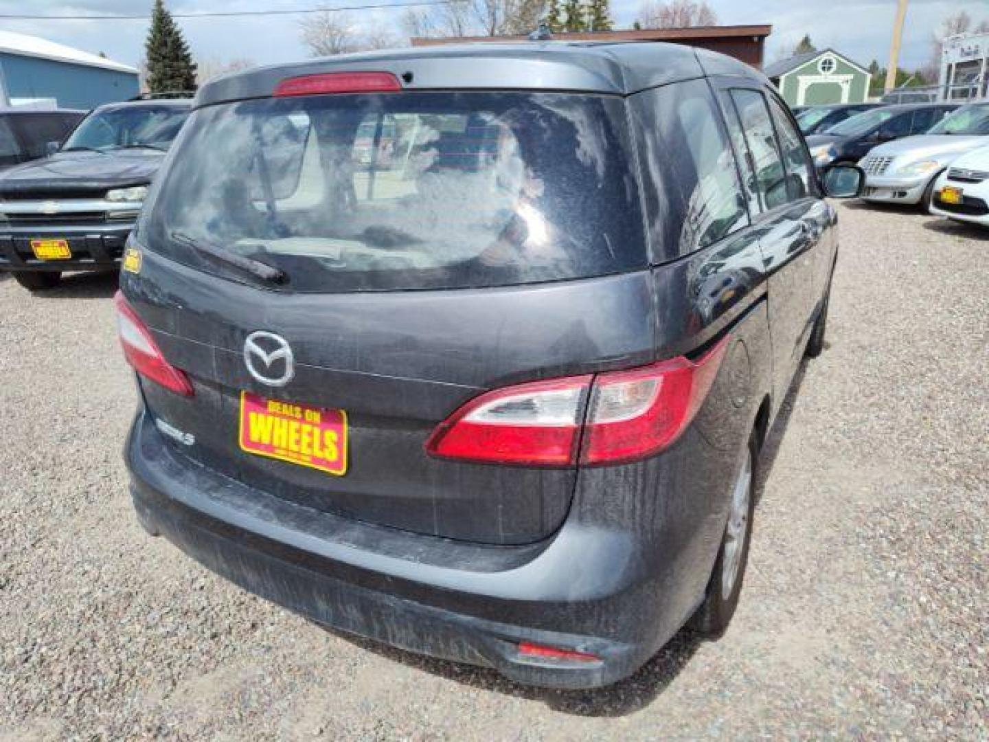 2014 Mazda MAZDA5 Sport AT (JM1CW2BL5E0) with an 2.5L L4 DOHC 16V engine, 5-Speed Automatic transmission, located at 4801 10th Ave S,, Great Falls, MT, 59405, 47.494347, -111.229942 - Photo#4