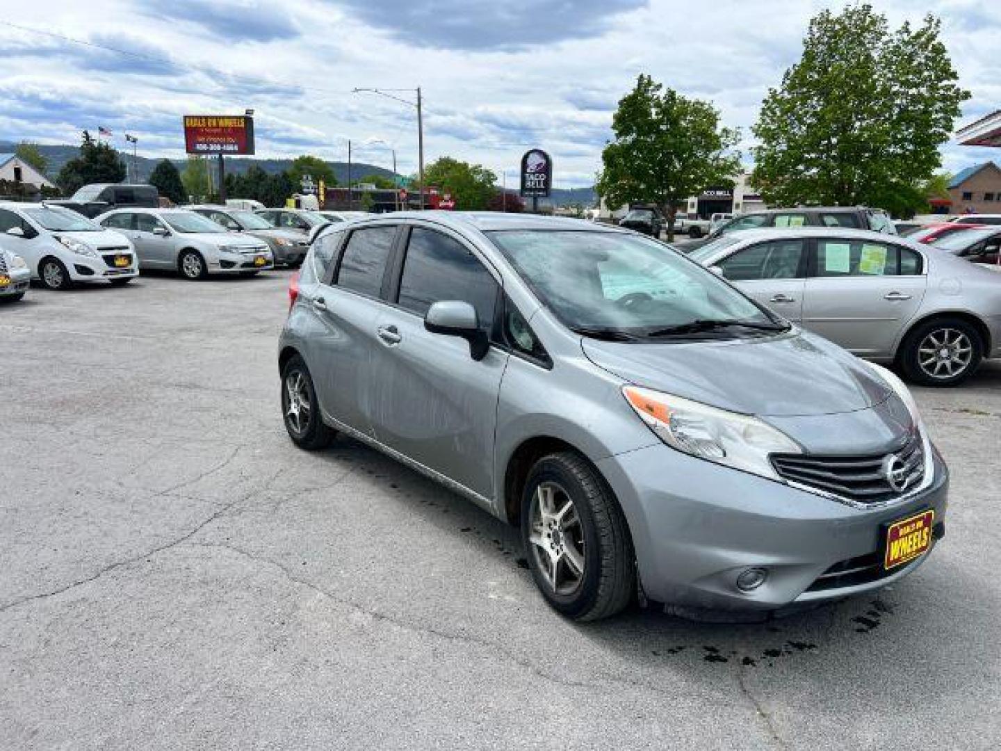 2014 Nissan Versa Note S (3N1CE2CPXEL) with an 1.6L L4 DOHC 16V engine, 5-Speed Manual transmission, located at 601 E. Idaho St., Kalispell, MT, 59901, 48.203983, -114.308662 - Photo#2