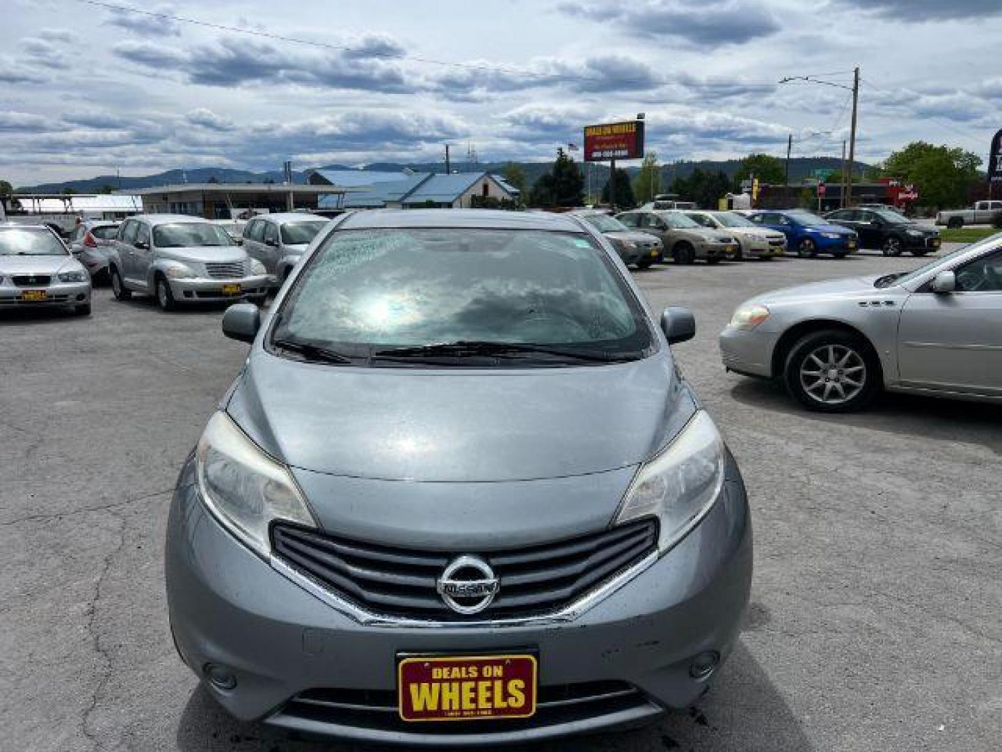 2014 Nissan Versa Note S (3N1CE2CPXEL) with an 1.6L L4 DOHC 16V engine, 5-Speed Manual transmission, located at 601 E. Idaho St., Kalispell, MT, 59901, 48.203983, -114.308662 - Photo#1