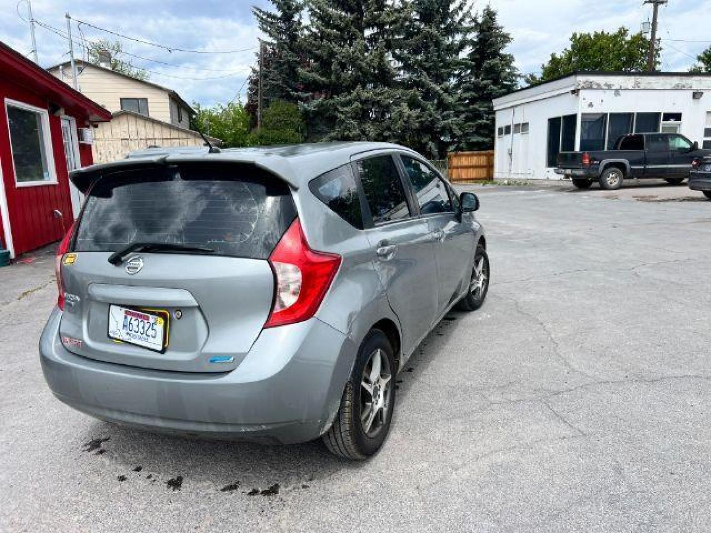 2014 Nissan Versa Note S (3N1CE2CPXEL) with an 1.6L L4 DOHC 16V engine, 5-Speed Manual transmission, located at 601 E. Idaho St., Kalispell, MT, 59901, 48.203983, -114.308662 - Photo#3