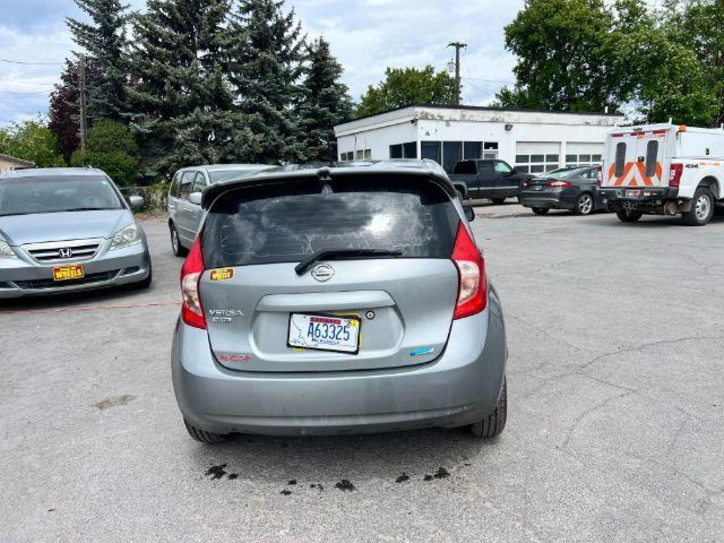 2014 Nissan Versa Note S (3N1CE2CPXEL) with an 1.6L L4 DOHC 16V engine, 5-Speed Manual transmission, located at 601 E. Idaho St., Kalispell, MT, 59901, 48.203983, -114.308662 - Photo#4