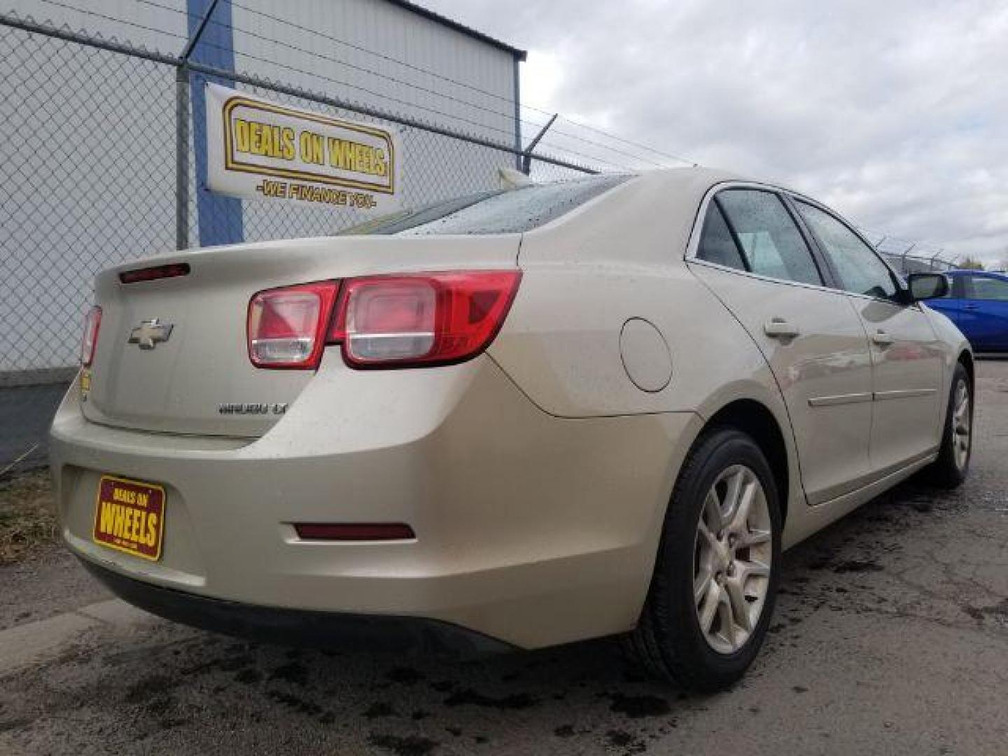 2015 Chevrolet Malibu 1LT (1G11C5SL4FF) with an 2.5L L4 DOHC 16V engine, 6-Speed Automatic transmission, located at 4801 10th Ave S,, Great Falls, MT, 59405, 47.494347, -111.229942 - Photo#4