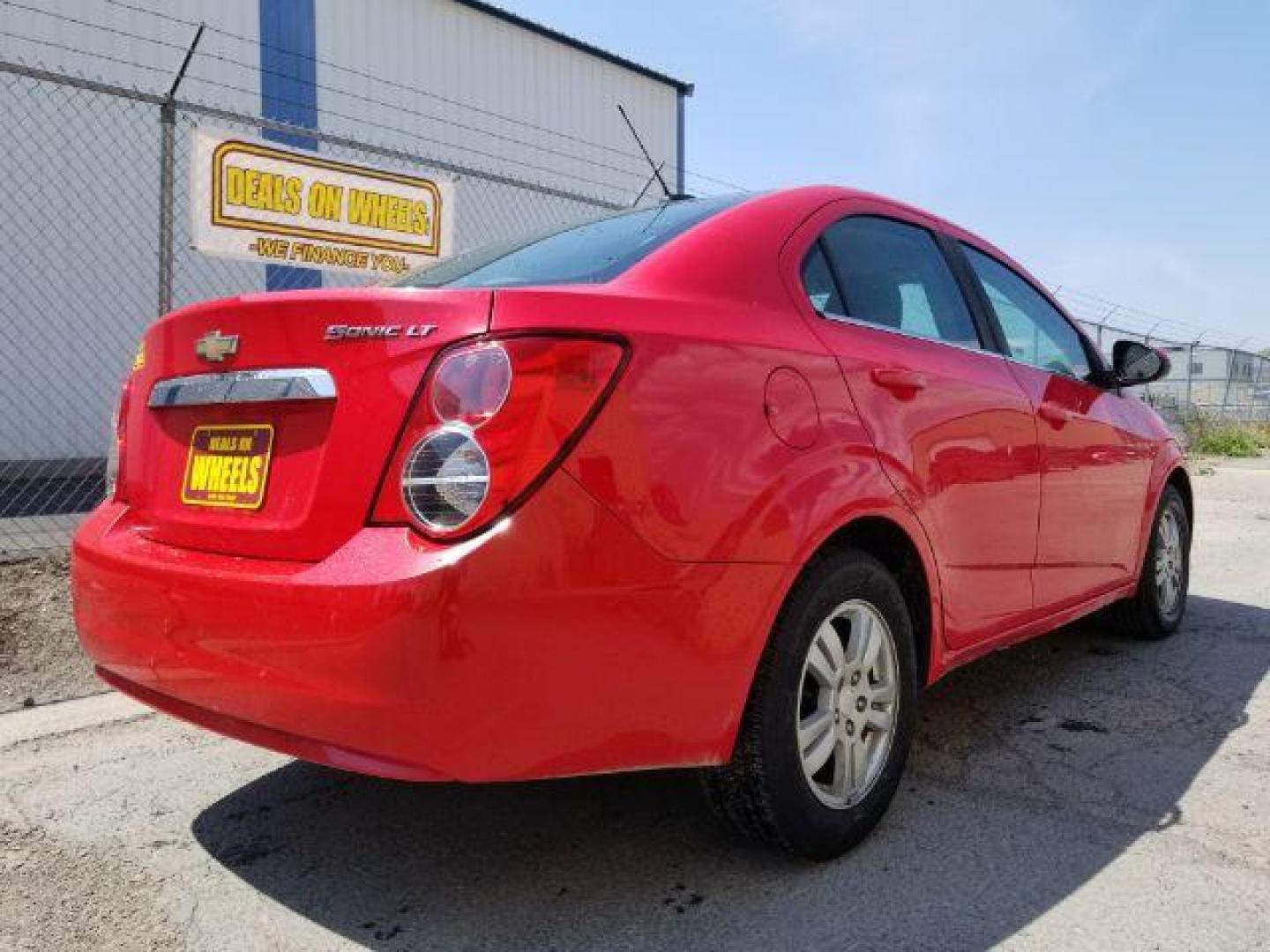 2015 Chevrolet Sonic LT Auto Sedan (1G1JC5SH0F4) with an 1.8L L4 DOHC 24V engine, 6-Speed Automatic transmission, located at 1800 West Broadway, Missoula, 59808, (406) 543-1986, 46.881348, -114.023628 - Photo#4