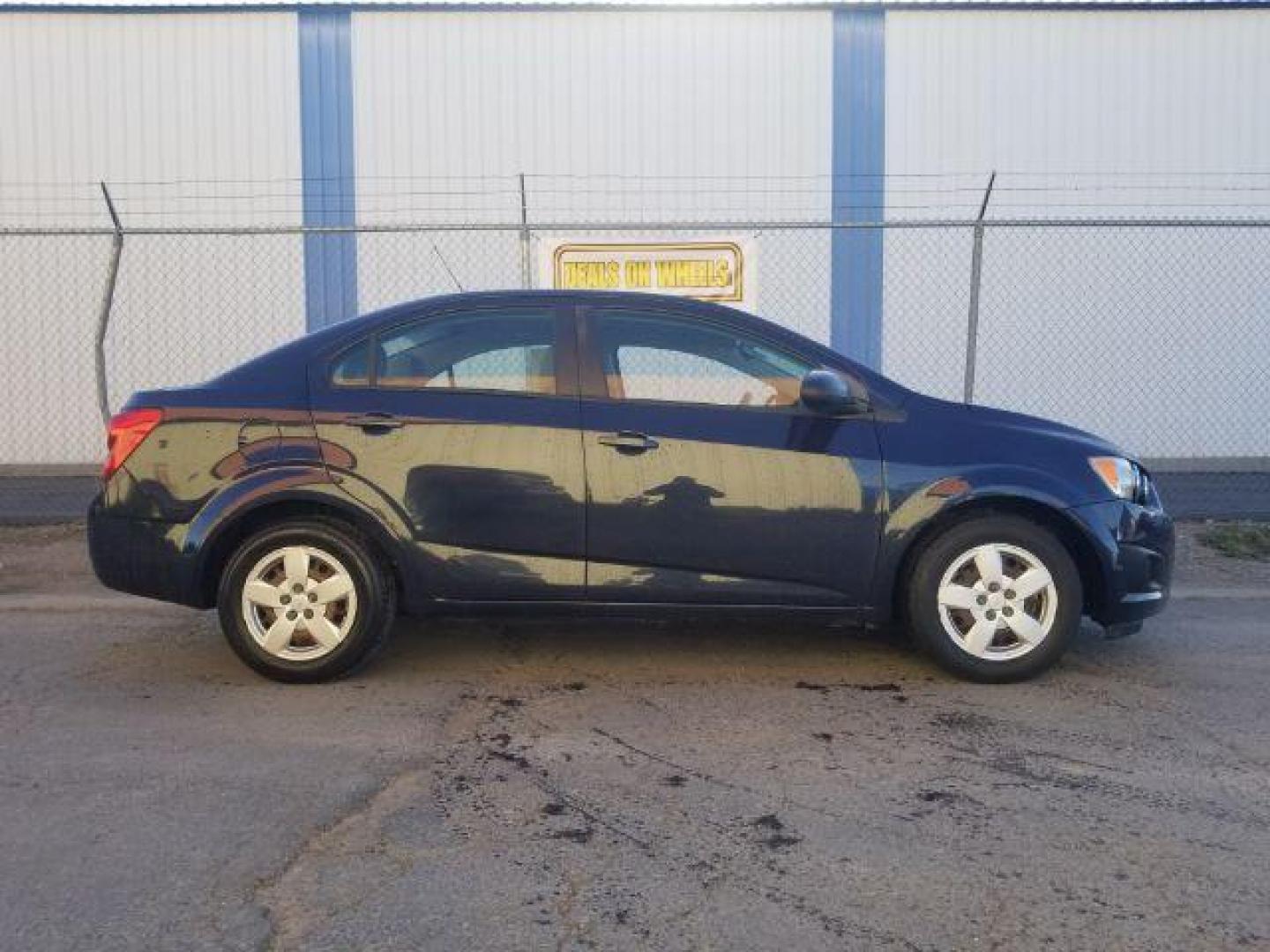 2015 Chevrolet Sonic LS Auto Sedan (1G1JA5SH5F4) with an 1.8L L4 DOHC 24V engine, 6-Speed Automatic transmission, located at 4047 Montana Ave., Billings, MT, 59101, 45.770847, -108.529800 - Photo#3