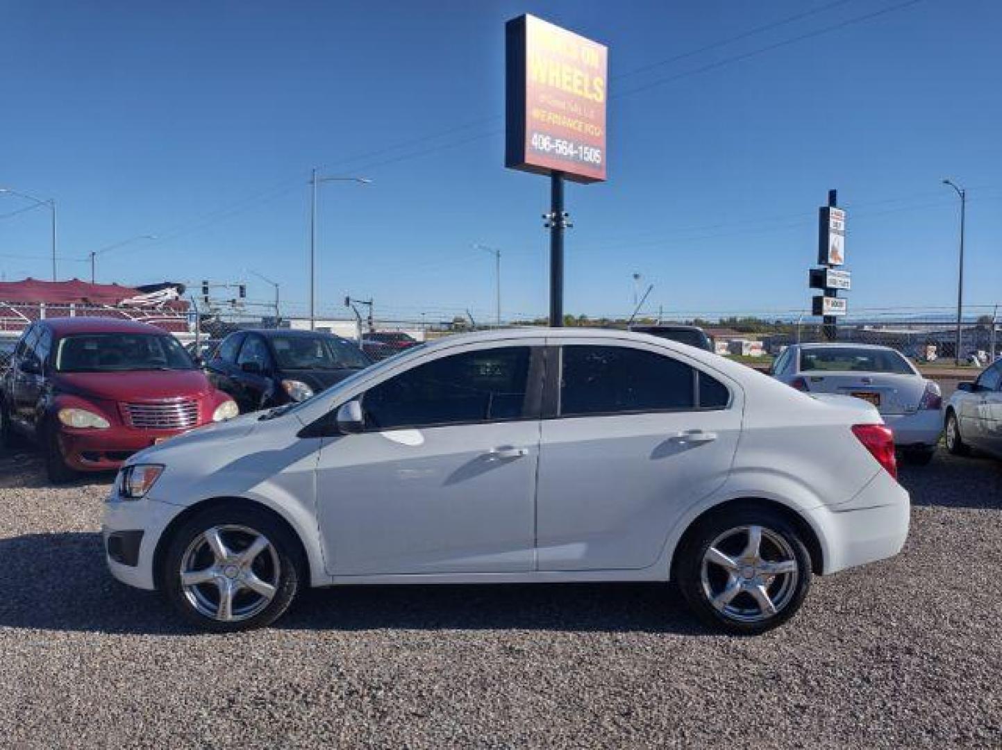 2015 Chevrolet Sonic LS Auto Sedan (1G1JA5SG2F4) with an 1.8L L4 DOHC 24V engine, 6-Speed Automatic transmission, located at 4801 10th Ave S,, Great Falls, MT, 59405, 47.494347, -111.229942 - Photo#1