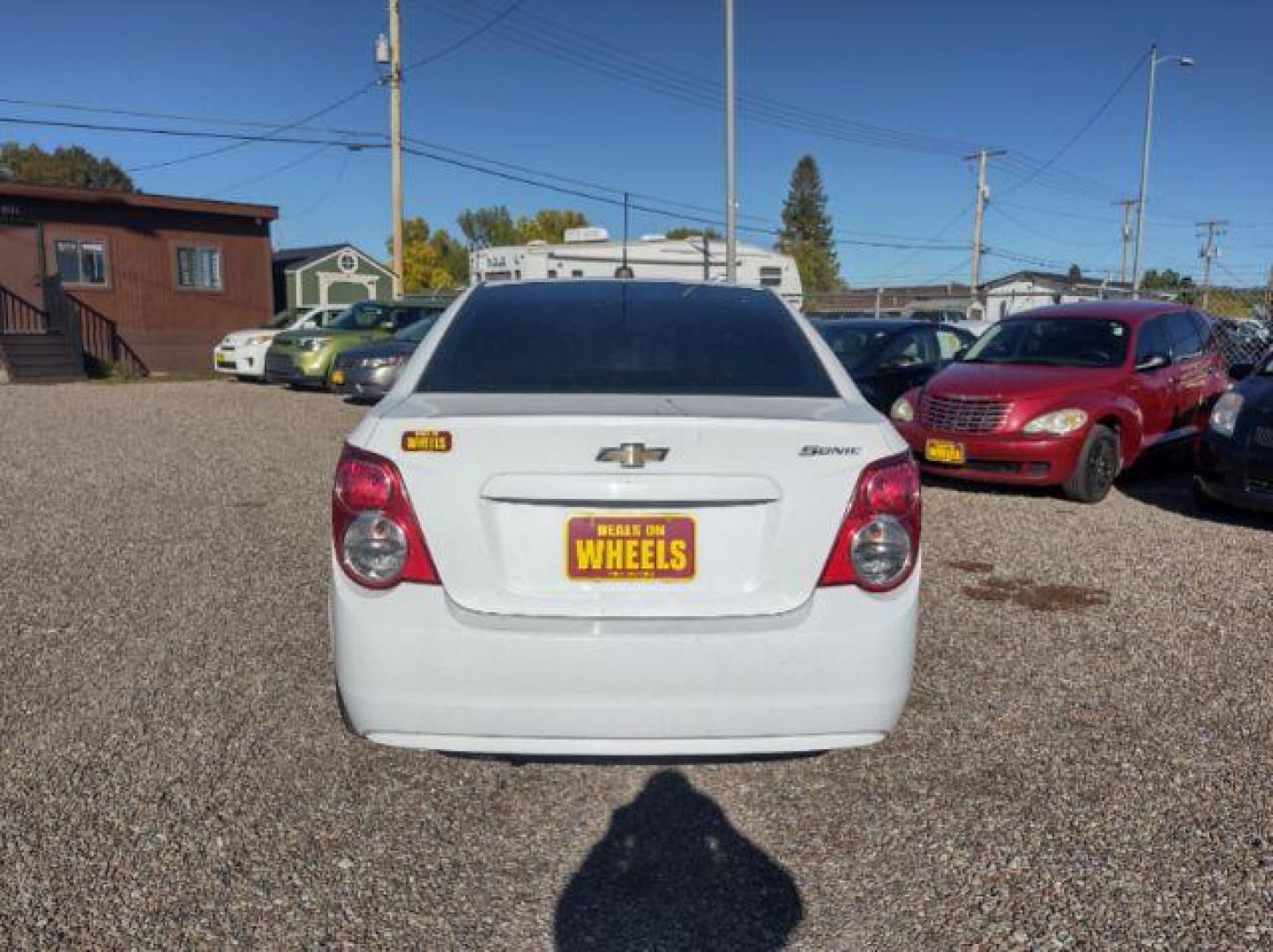 2015 Chevrolet Sonic LS Auto Sedan (1G1JA5SG2F4) with an 1.8L L4 DOHC 24V engine, 6-Speed Automatic transmission, located at 4801 10th Ave S,, Great Falls, MT, 59405, 47.494347, -111.229942 - Photo#3