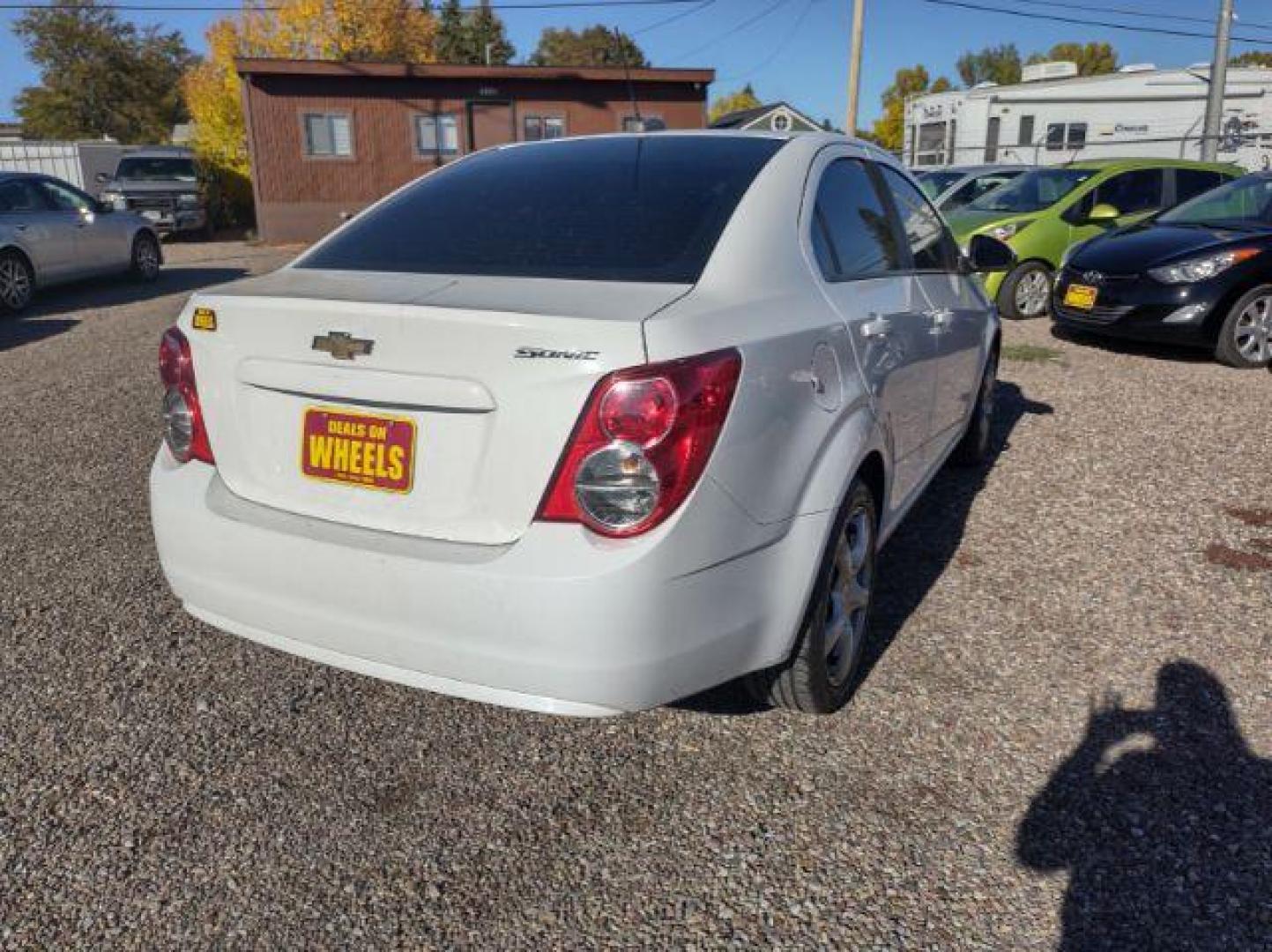 2015 Chevrolet Sonic LS Auto Sedan (1G1JA5SG2F4) with an 1.8L L4 DOHC 24V engine, 6-Speed Automatic transmission, located at 4801 10th Ave S,, Great Falls, MT, 59405, 47.494347, -111.229942 - Photo#4