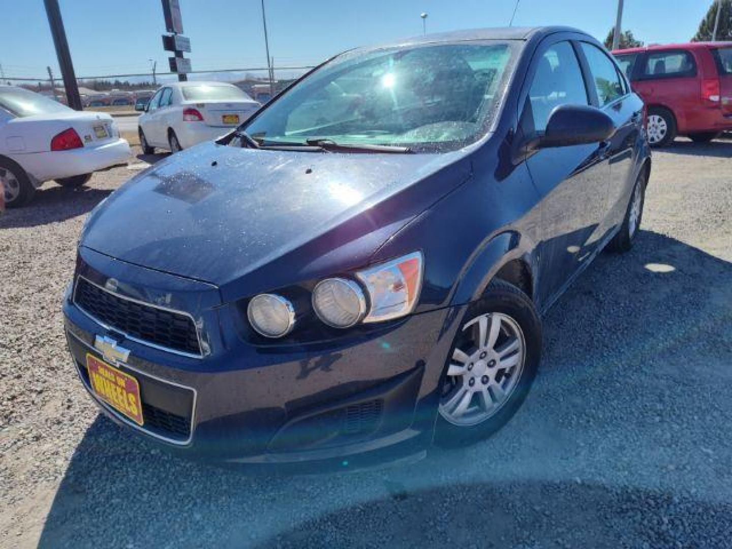 2015 Chevrolet Sonic LT Auto Sedan (1G1JC5SHXF4) with an 1.8L L4 DOHC 24V engine, 6-Speed Automatic transmission, located at 4801 10th Ave S,, Great Falls, MT, 59405, 47.494347, -111.229942 - Photo#0