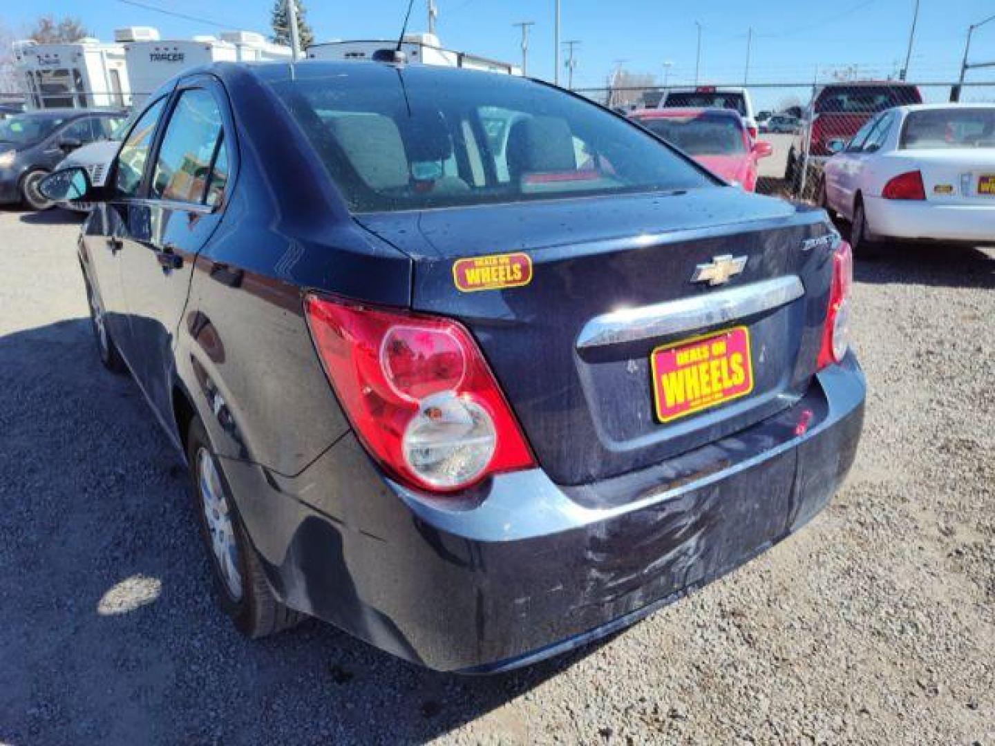 2015 Chevrolet Sonic LT Auto Sedan (1G1JC5SHXF4) with an 1.8L L4 DOHC 24V engine, 6-Speed Automatic transmission, located at 4801 10th Ave S,, Great Falls, MT, 59405, 47.494347, -111.229942 - Photo#2