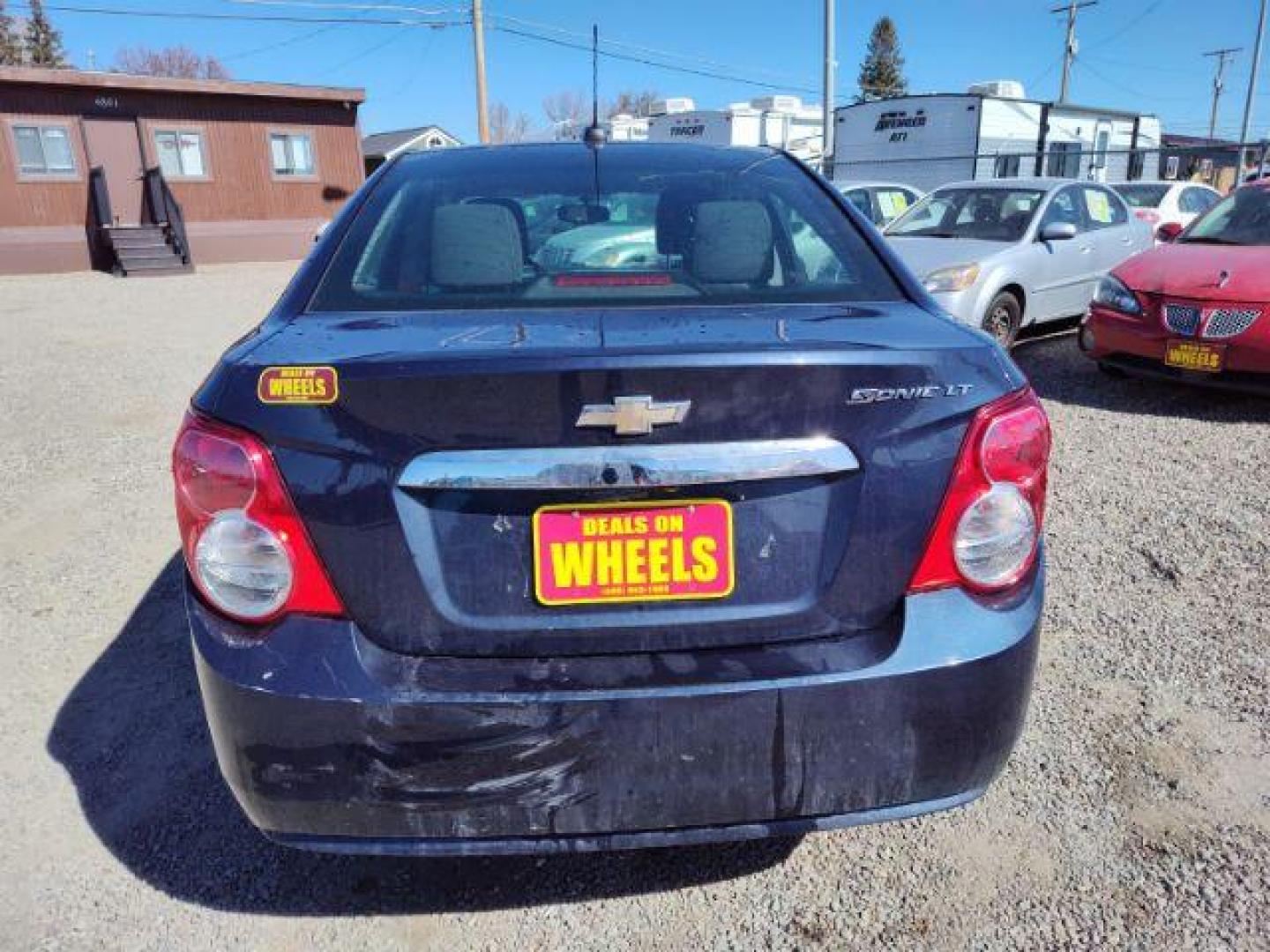 2015 Chevrolet Sonic LT Auto Sedan (1G1JC5SHXF4) with an 1.8L L4 DOHC 24V engine, 6-Speed Automatic transmission, located at 4801 10th Ave S,, Great Falls, MT, 59405, 47.494347, -111.229942 - Photo#3