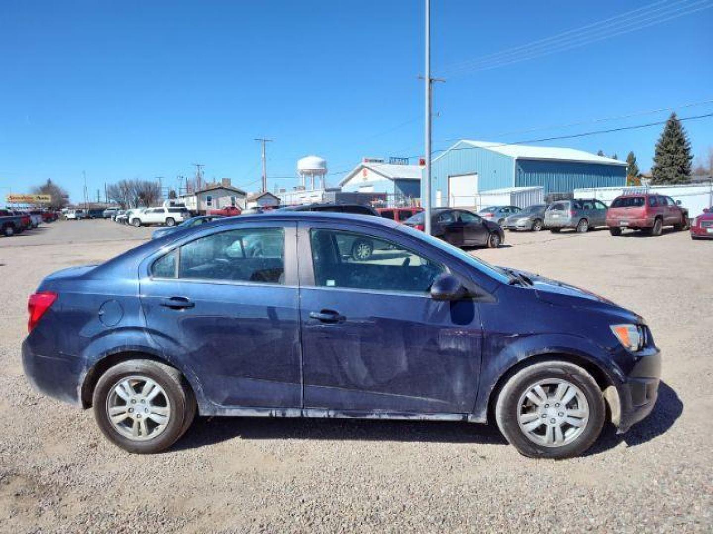 2015 Chevrolet Sonic LT Auto Sedan (1G1JC5SHXF4) with an 1.8L L4 DOHC 24V engine, 6-Speed Automatic transmission, located at 4801 10th Ave S,, Great Falls, MT, 59405, 47.494347, -111.229942 - Photo#5