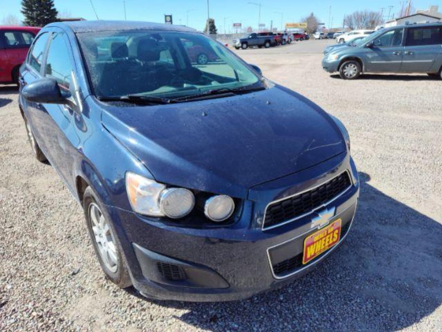 2015 Chevrolet Sonic LT Auto Sedan (1G1JC5SHXF4) with an 1.8L L4 DOHC 24V engine, 6-Speed Automatic transmission, located at 4801 10th Ave S,, Great Falls, MT, 59405, 47.494347, -111.229942 - Photo#7