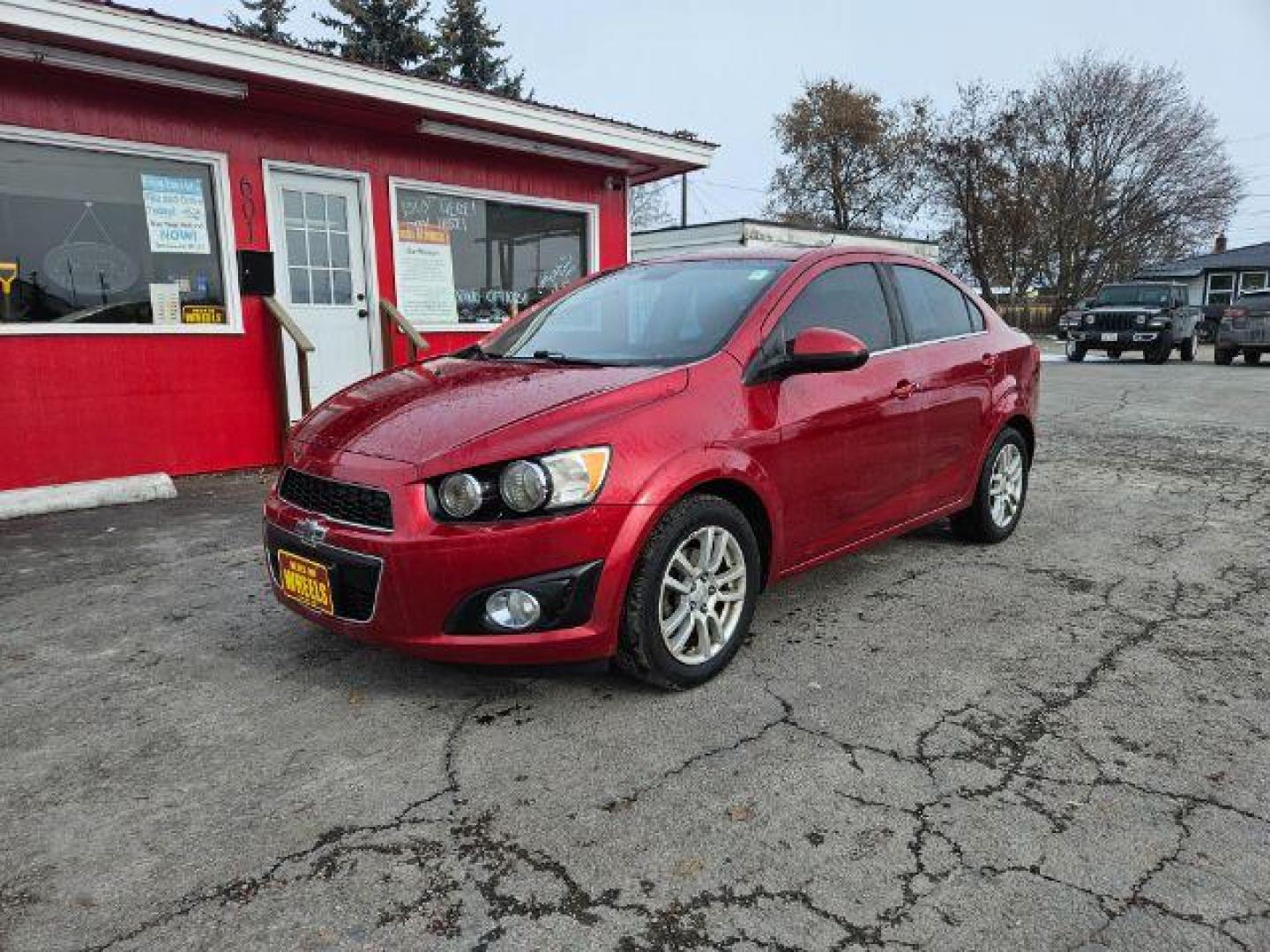 2015 Chevrolet Sonic LT Auto Sedan (1G1JC5SH4F4) with an 1.8L L4 DOHC 24V engine, 6-Speed Automatic transmission, located at 601 E. Idaho St., Kalispell, MT, 59901, 48.203983, -114.308662 - Photo#0