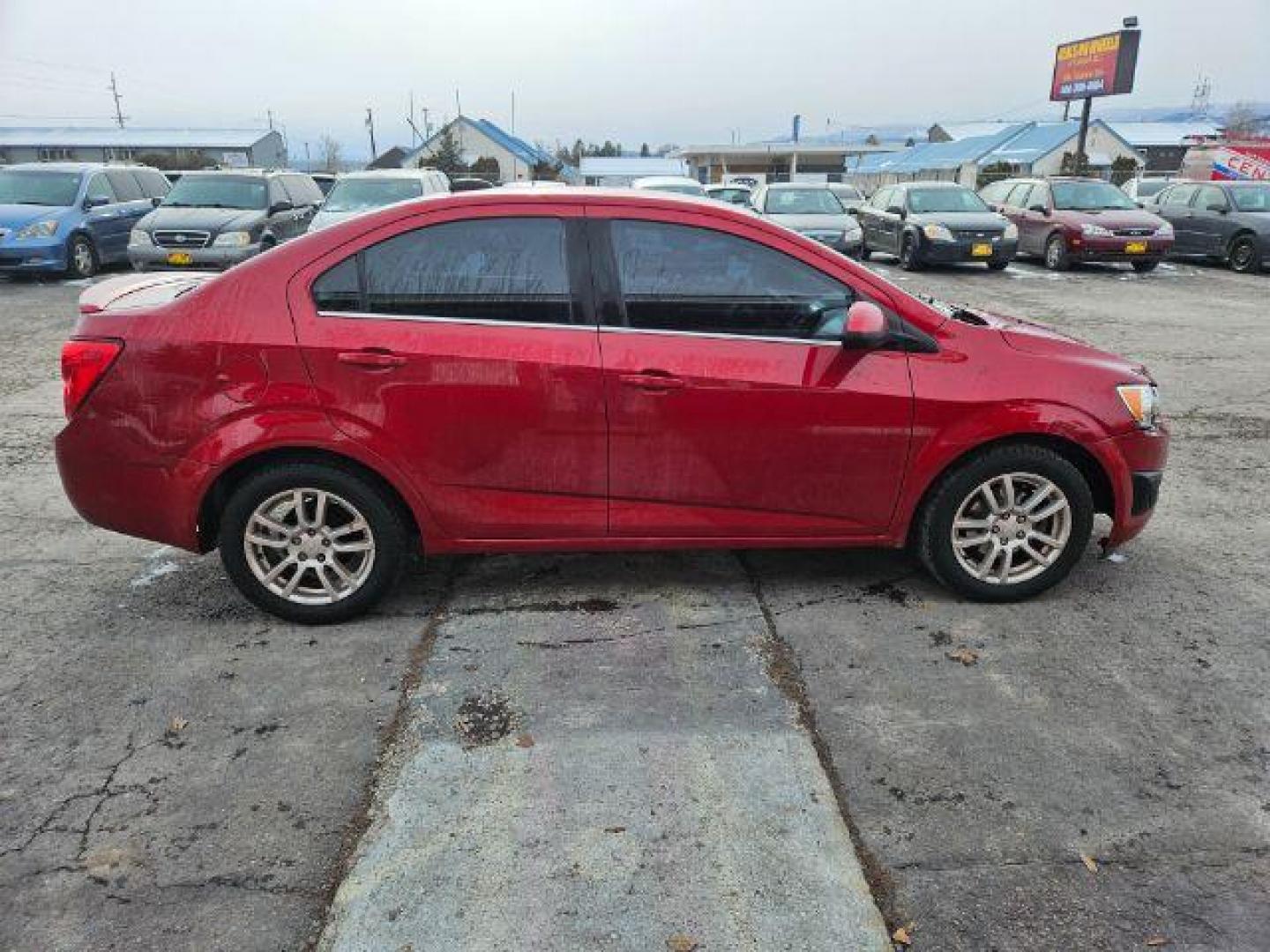 2015 Chevrolet Sonic LT Auto Sedan (1G1JC5SH4F4) with an 1.8L L4 DOHC 24V engine, 6-Speed Automatic transmission, located at 601 E. Idaho St., Kalispell, MT, 59901, 48.203983, -114.308662 - Photo#5