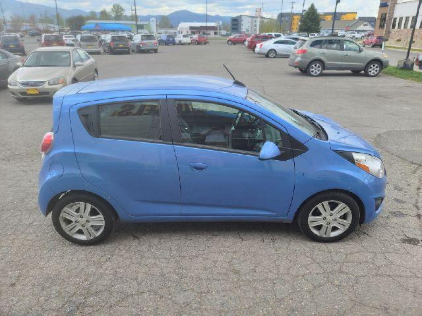 2015 Chevrolet Spark HATCHBACK 4-DR (KL8CA6S94FC) with an 1.2L L4 16V DOHC engine, 5-Speed Manual transmission, located at 1800 West Broadway, Missoula, 59808, (406) 543-1986, 46.881348, -114.023628 - Photo#2