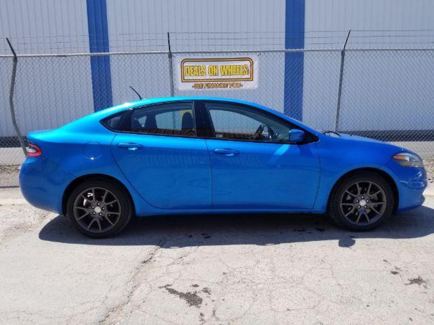 2015 Dodge Dart SE (1C3CDFAA3FD) with an 2.0L L4 DOHC 16V TURBO engine, located at 601 E. Idaho St., Kalispell, MT, 59901, 48.203983, -114.308662 - Photo#5