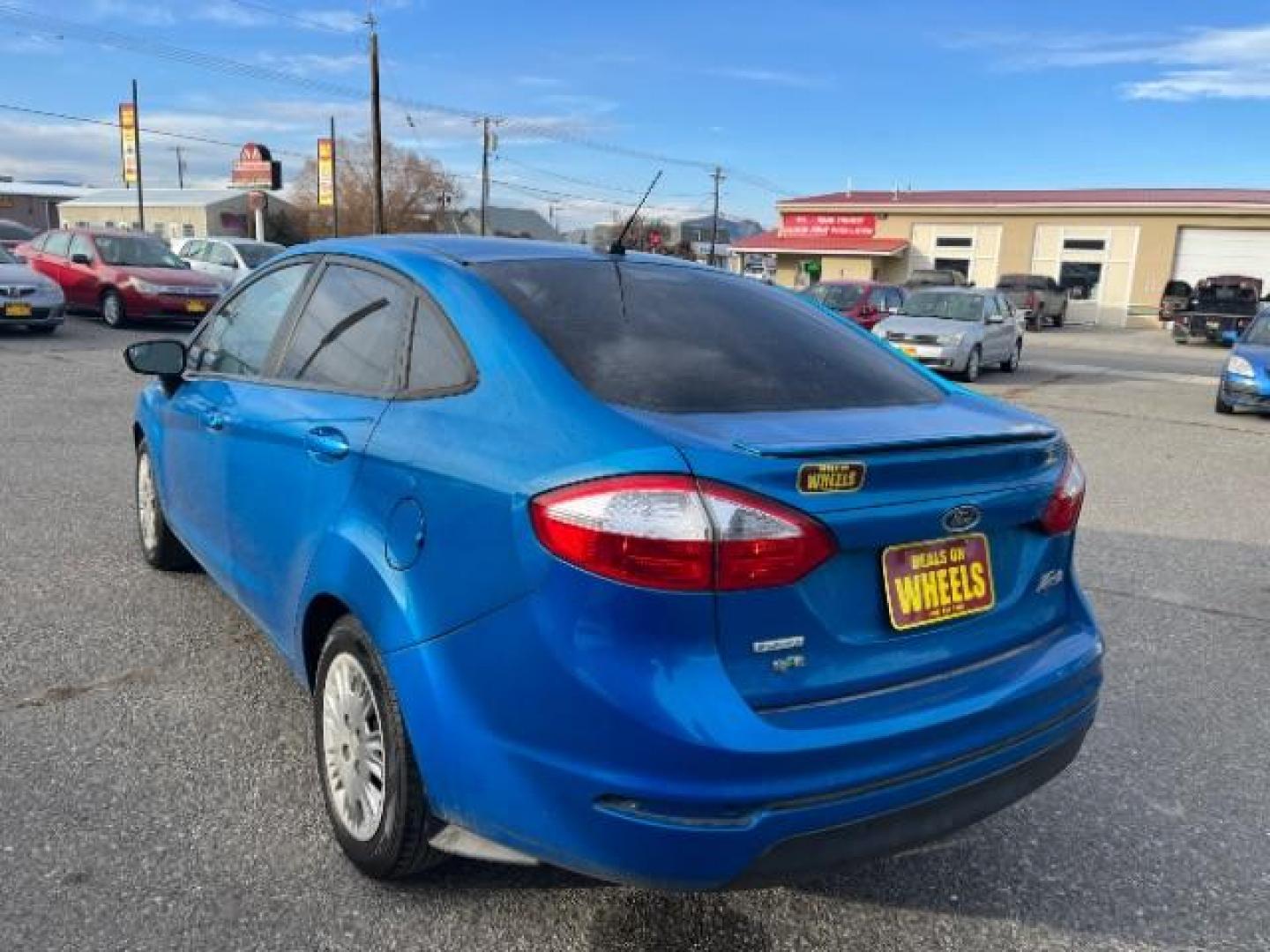 2015 Ford Fiesta SE Sedan (3FADP4BE9FM) with an 1.0L L3 engine, located at 1821 N Montana Ave., Helena, MT, 59601, 46.603447, -112.022781 - Photo#2