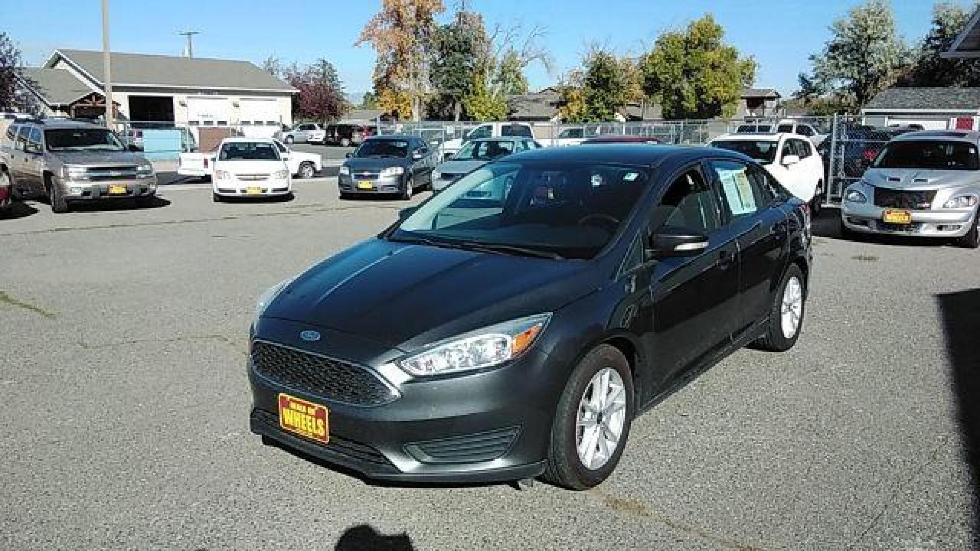 2015 Ford Focus SE Sedan (1FADP3F29FL) with an 2.0L L4 DOHC 16V engine, located at 1800 West Broadway, Missoula, 59808, (406) 543-1986, 46.881348, -114.023628 - Photo#0