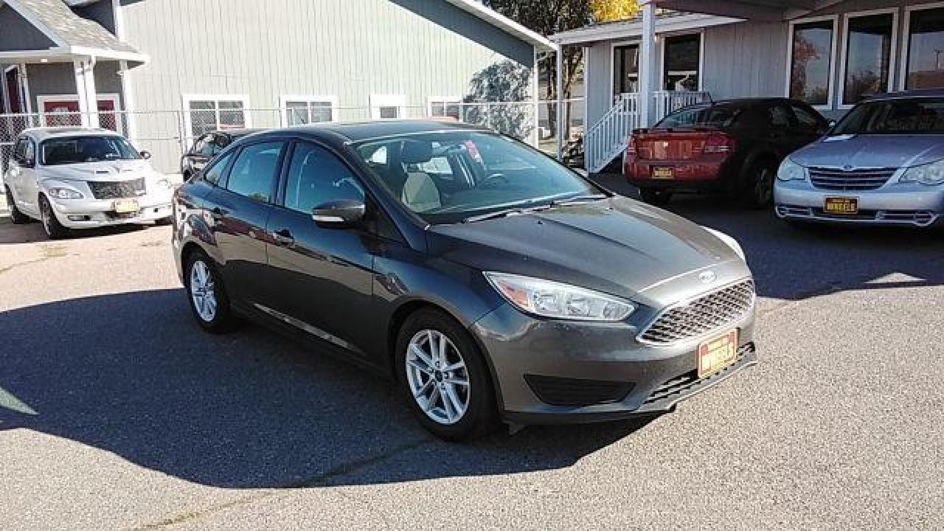 2015 Ford Focus SE Sedan (1FADP3F29FL) with an 2.0L L4 DOHC 16V engine, located at 1800 West Broadway, Missoula, 59808, (406) 543-1986, 46.881348, -114.023628 - Photo#2