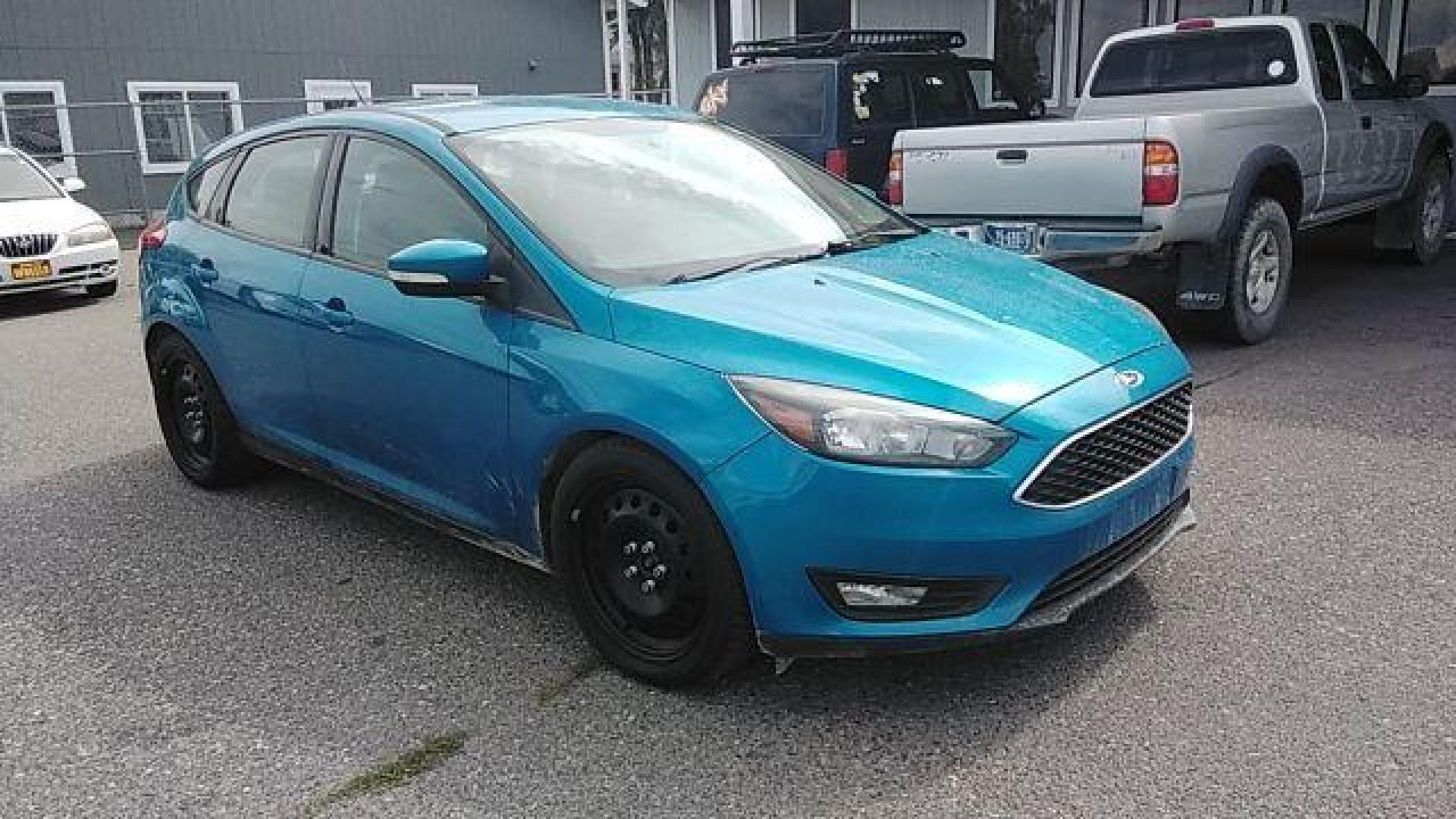 2015 Ford Focus SE Hatch (1FADP3K29FL) with an 2.0L L4 DOHC 16V engine, 5-Speed Manual transmission, located at 1821 N Montana Ave., Helena, MT, 59601, 46.603447, -112.022781 - Photo#2