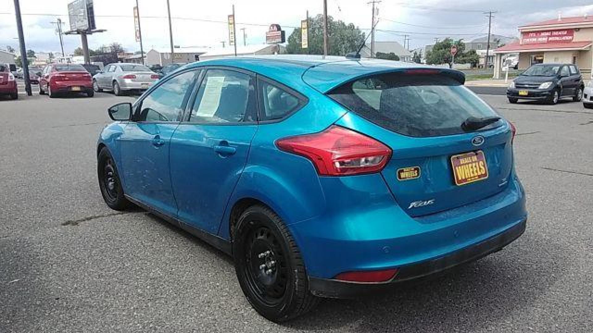 2015 Ford Focus SE Hatch (1FADP3K29FL) with an 2.0L L4 DOHC 16V engine, 5-Speed Manual transmission, located at 1821 N Montana Ave., Helena, MT, 59601, 46.603447, -112.022781 - Photo#6