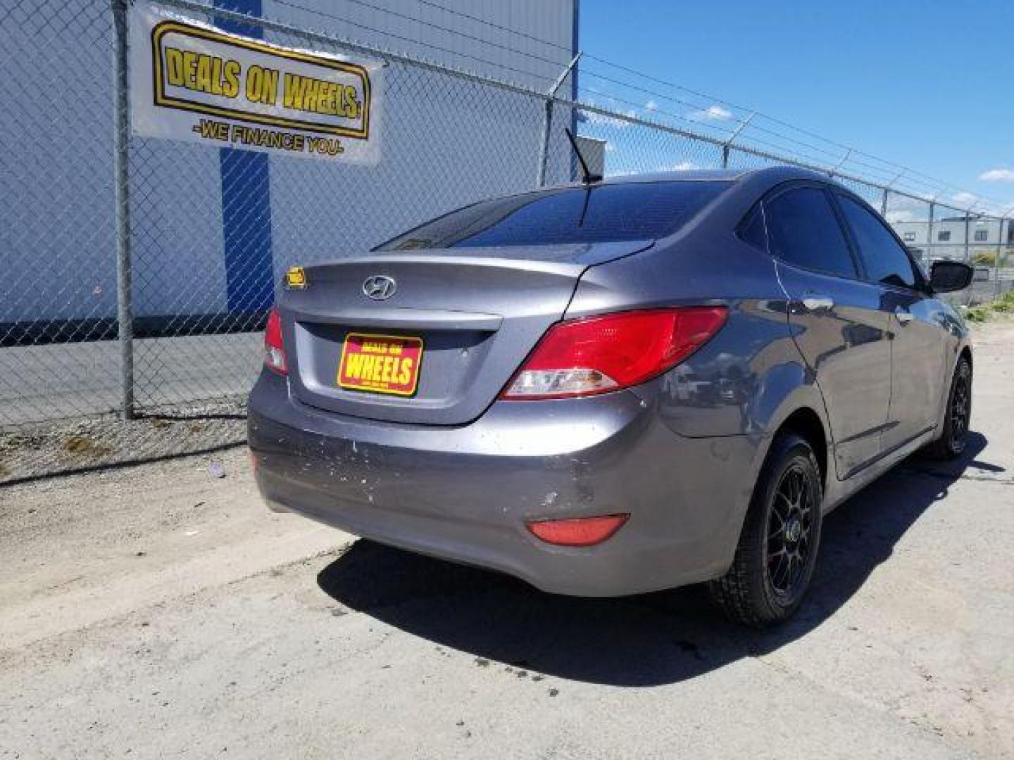 2015 Hyundai Accent GLS 4-Door 6A (KMHCT4AE3FU) with an 1.6L L4 DOHC 16V engine, 6-Speed Automatic transmission, located at 1821 N Montana Ave., Helena, MT, 59601, 46.603447, -112.022781 - Photo#4