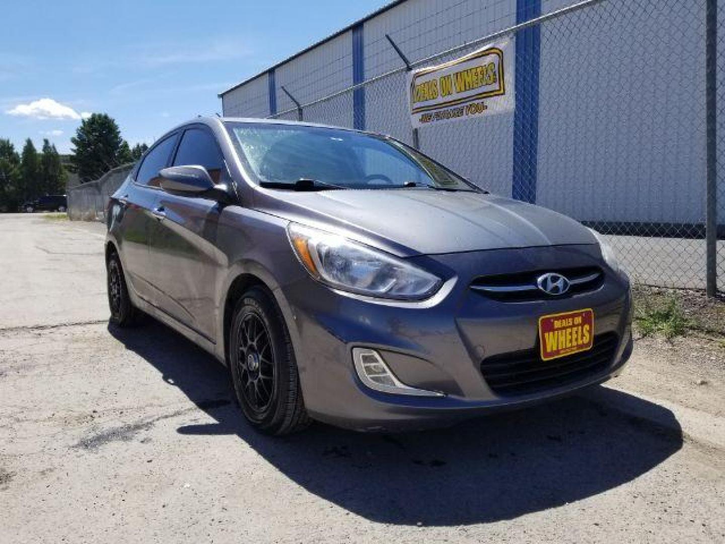 2015 Hyundai Accent GLS 4-Door 6A (KMHCT4AE3FU) with an 1.6L L4 DOHC 16V engine, 6-Speed Automatic transmission, located at 1821 N Montana Ave., Helena, MT, 59601, 46.603447, -112.022781 - Photo#6