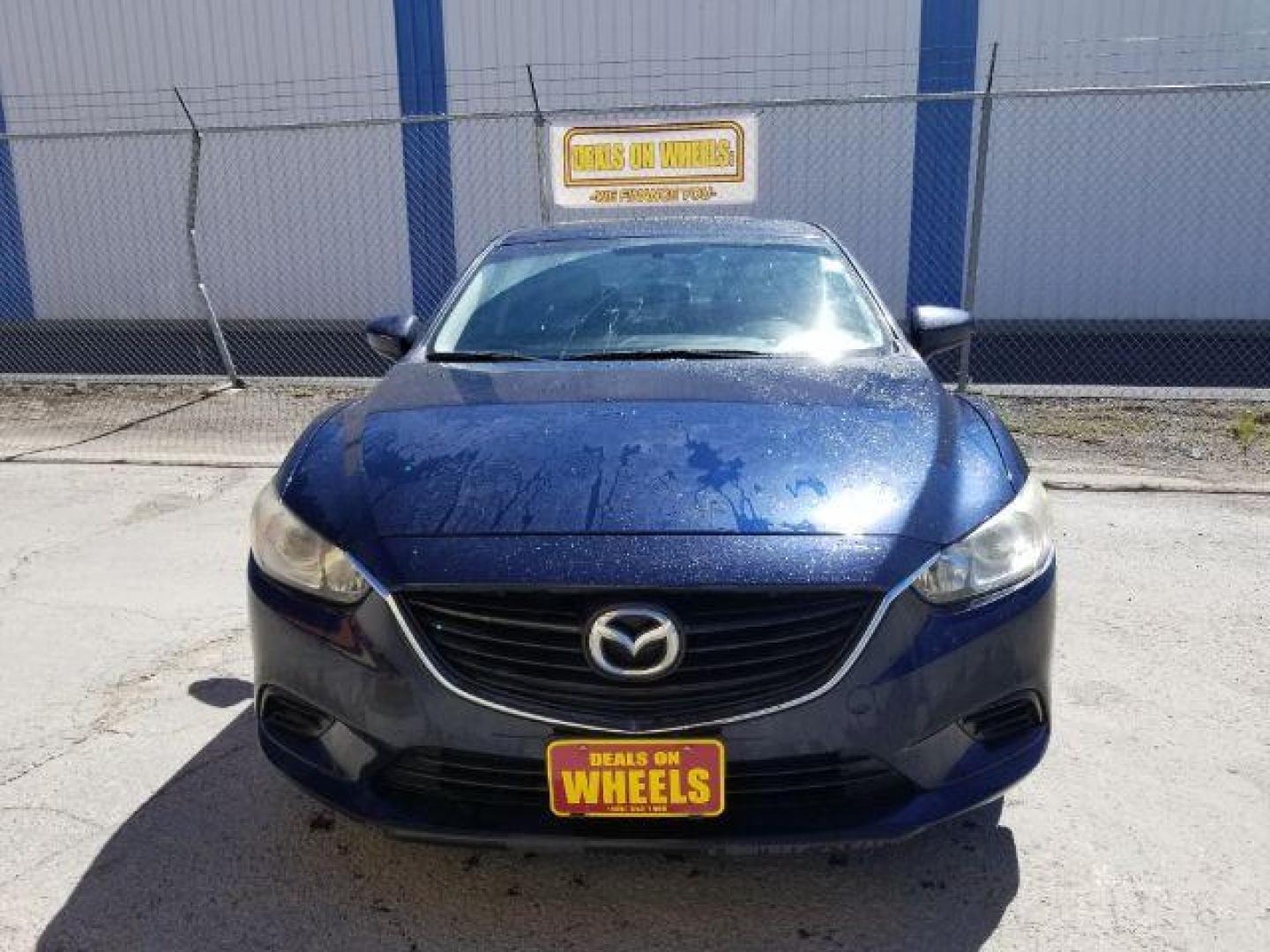 2015 Deep Crystal Blue Mazda Mazda6 i Touring (JM1GJ1V56F1) with an 2.5L L4 DOHC 16V engine, 6-Speed Automatic transmission, located at 4047 Montana Ave., Billings, MT, 59101, 45.770847, -108.529800 - Photo#1