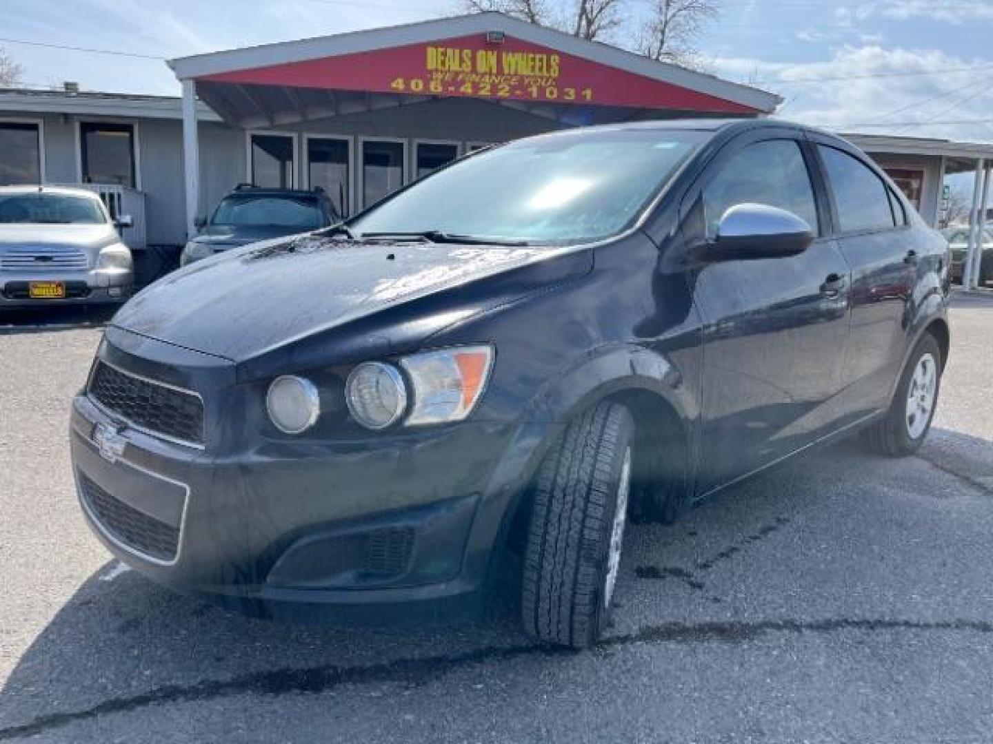 2016 Chevrolet Sonic LS Auto Sedan (1G1JA5SH2G4) with an 1.8L L4 DOHC 24V engine, 6-Speed Automatic transmission, located at 1821 N Montana Ave., Helena, MT, 59601, 46.603447, -112.022781 - Photo#0